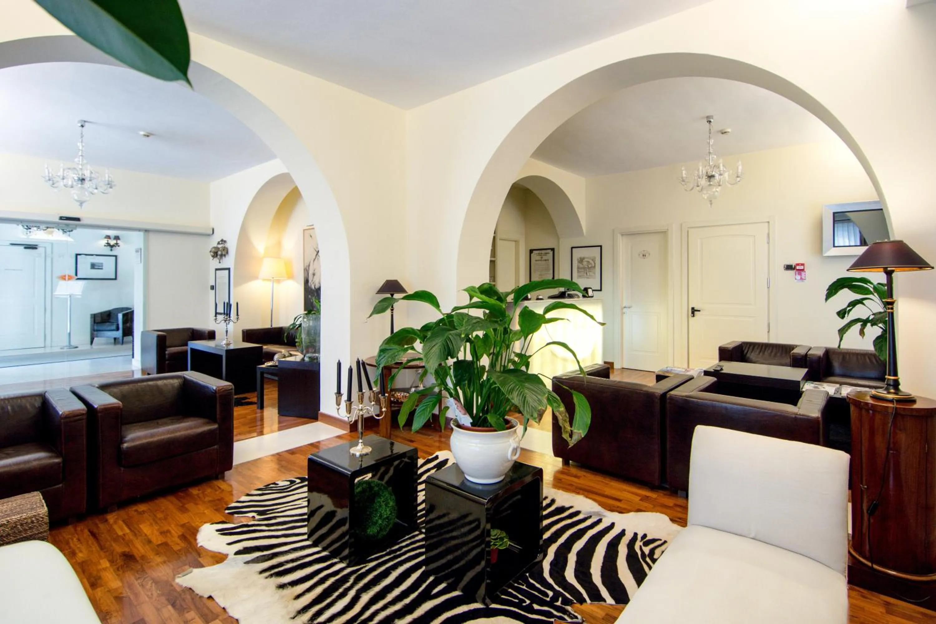 Communal lounge/ TV room in Terrazza Marconi Hotel&Spamarine