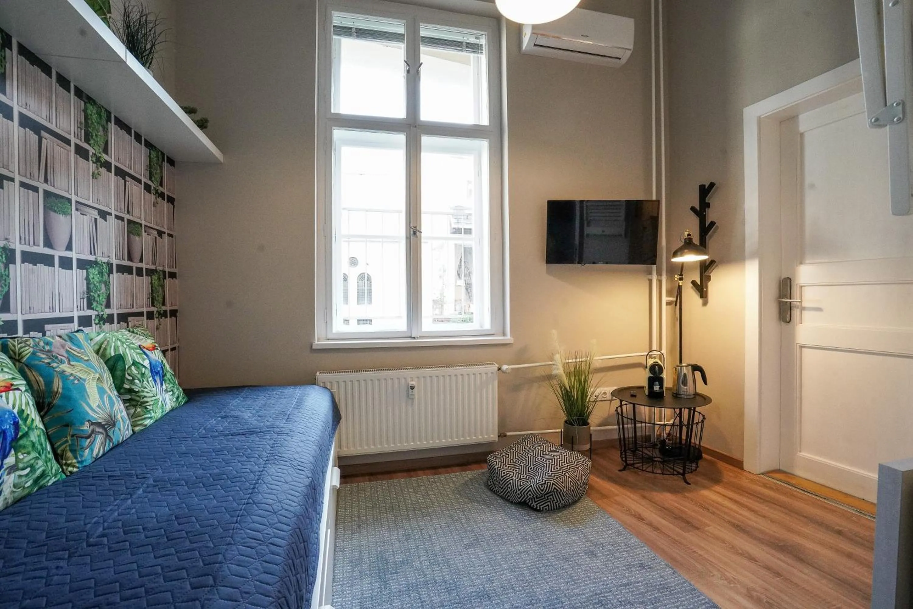 Bed in Palms Apartments Budapest