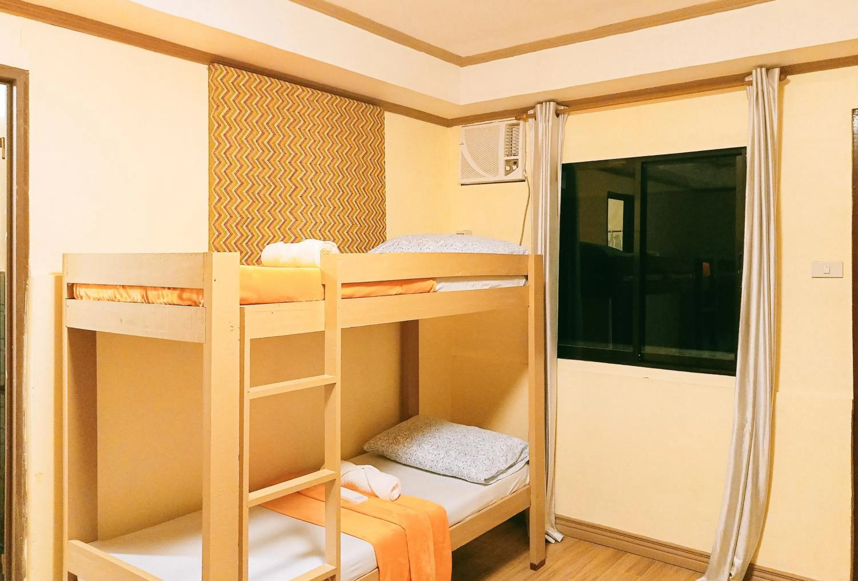 Bed in Maribel’s Pension Sindangan