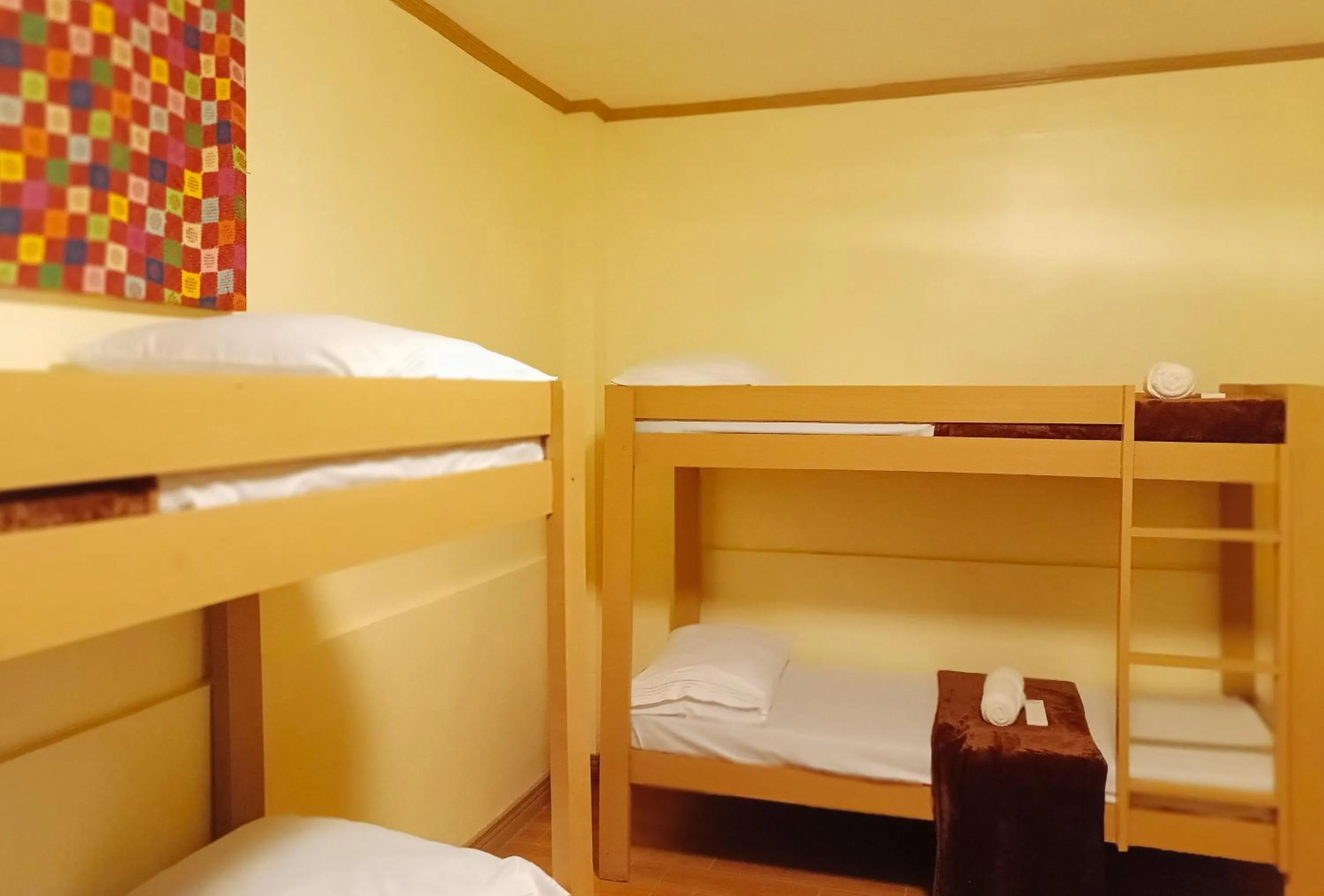 Photo of the whole room, Bed in Maribel’s Pension Sindangan