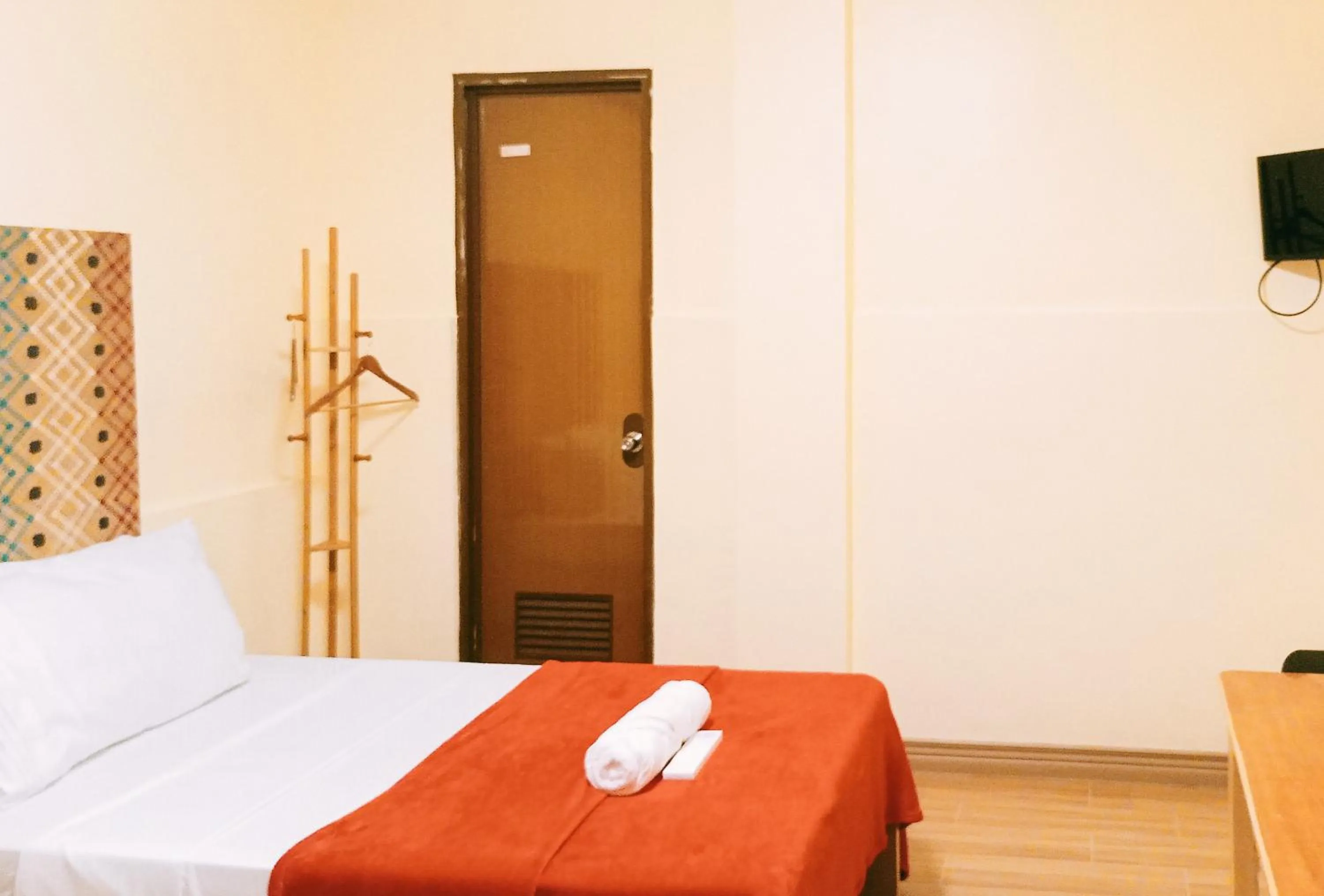 Bed in Maribel’s Pension Sindangan