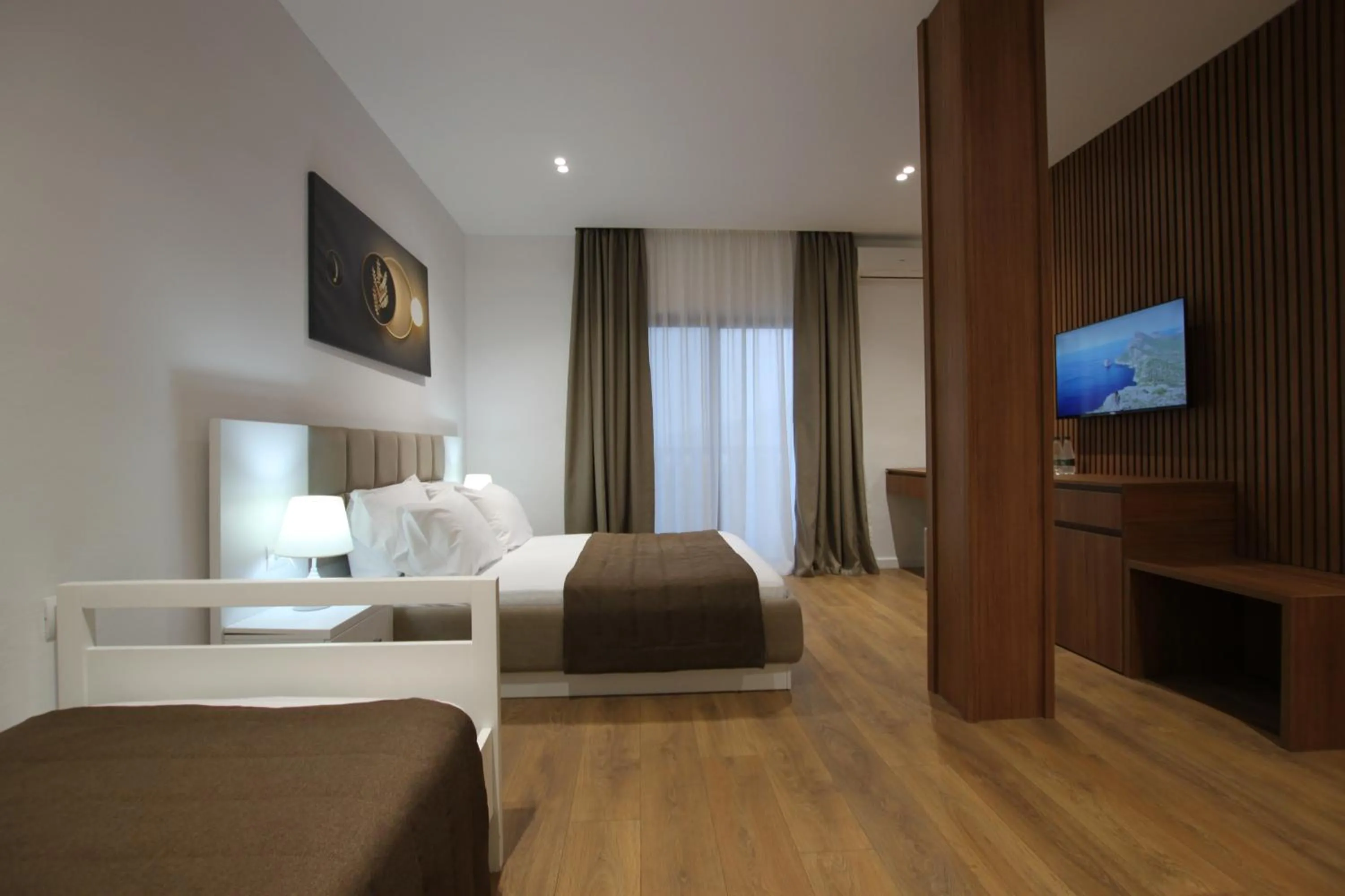 Triple Room with Sea View in ORCHIDS Hotel