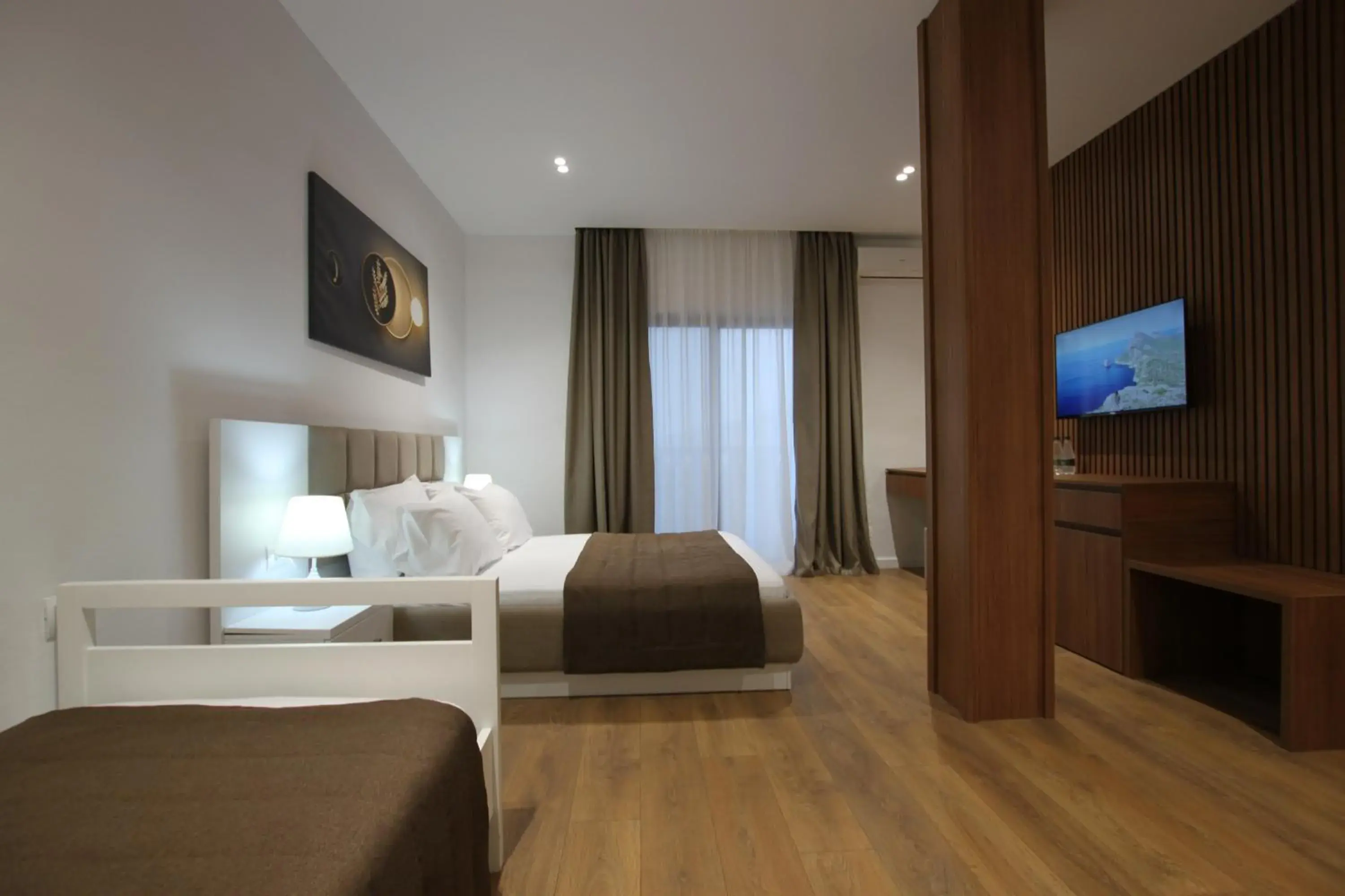 Triple Room with Sea View in ORCHIDS Hotel Triple Room with Sea View in ORCHIDS Hotel