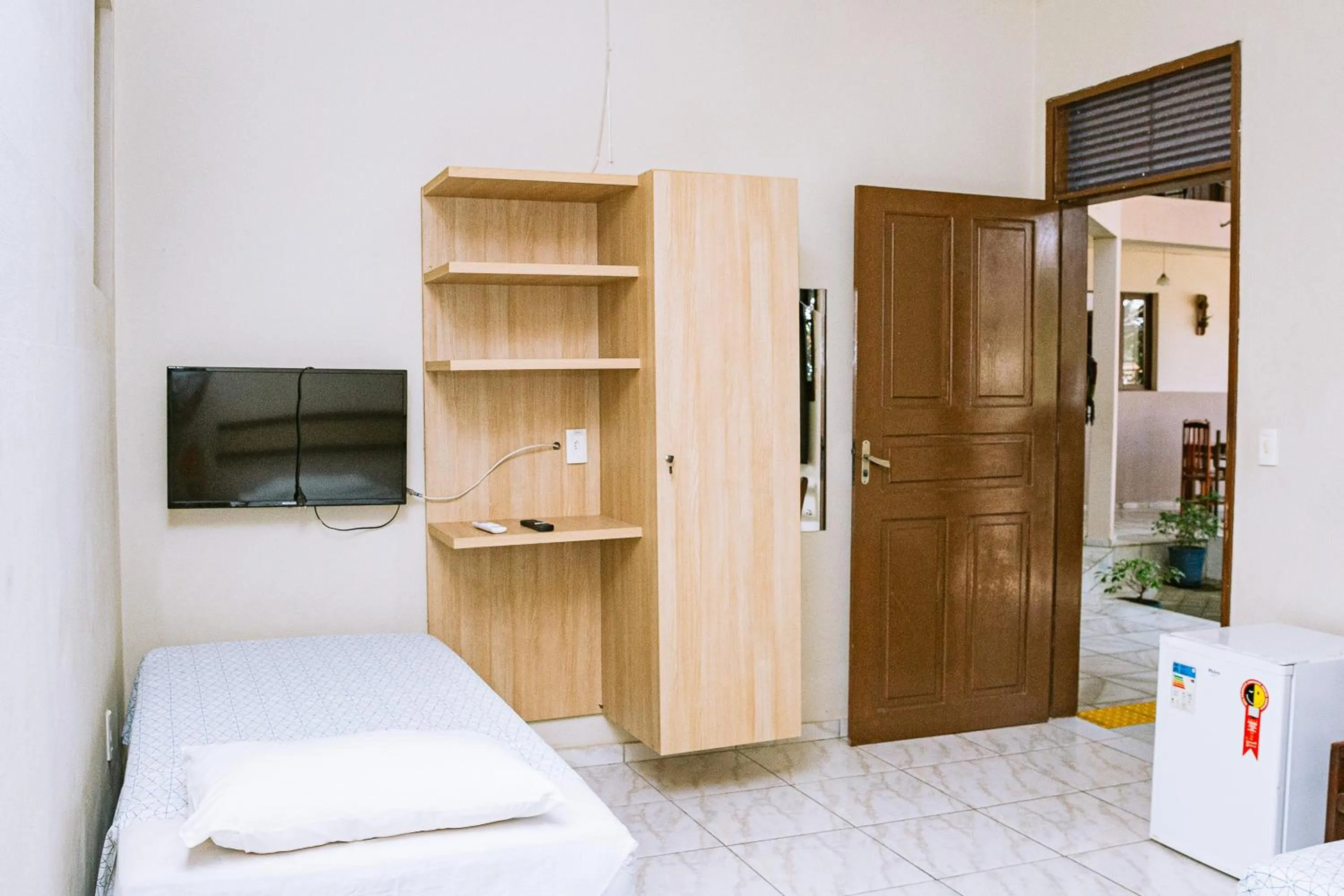 Bed in Pousada Casarão 2030