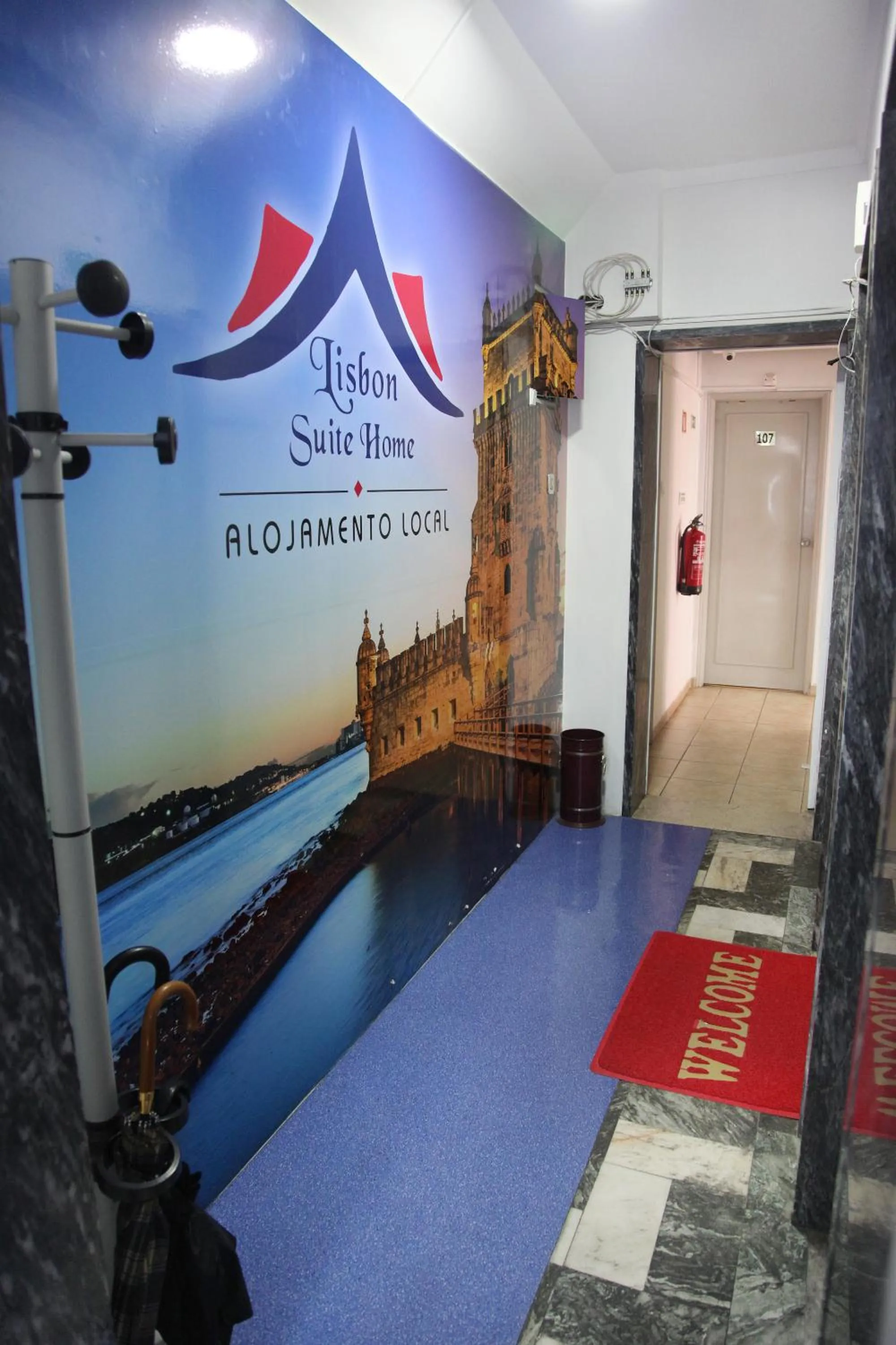 Property logo or sign in Lisbon Suite Home