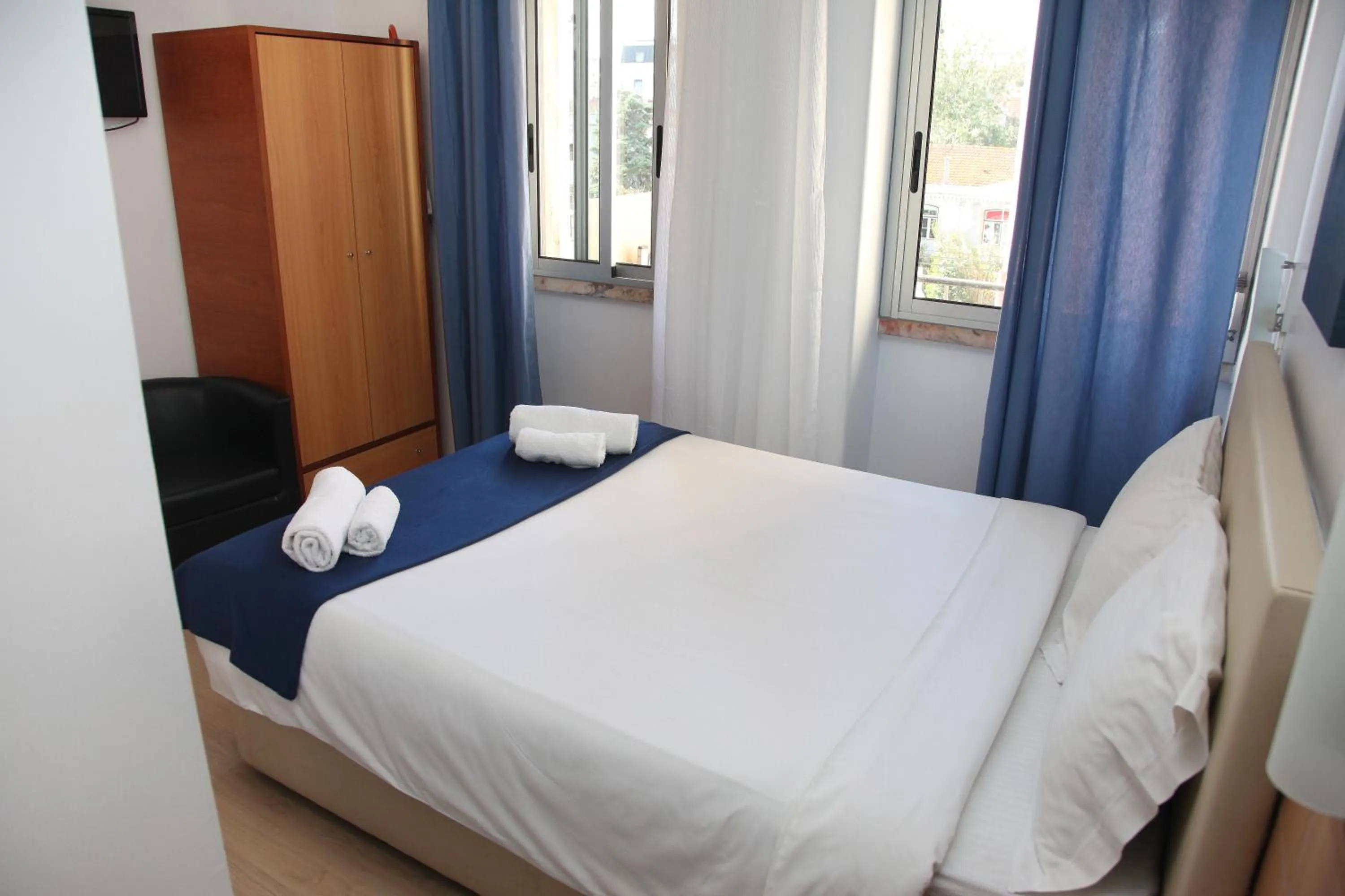 Bed in Lisbon Suite Home