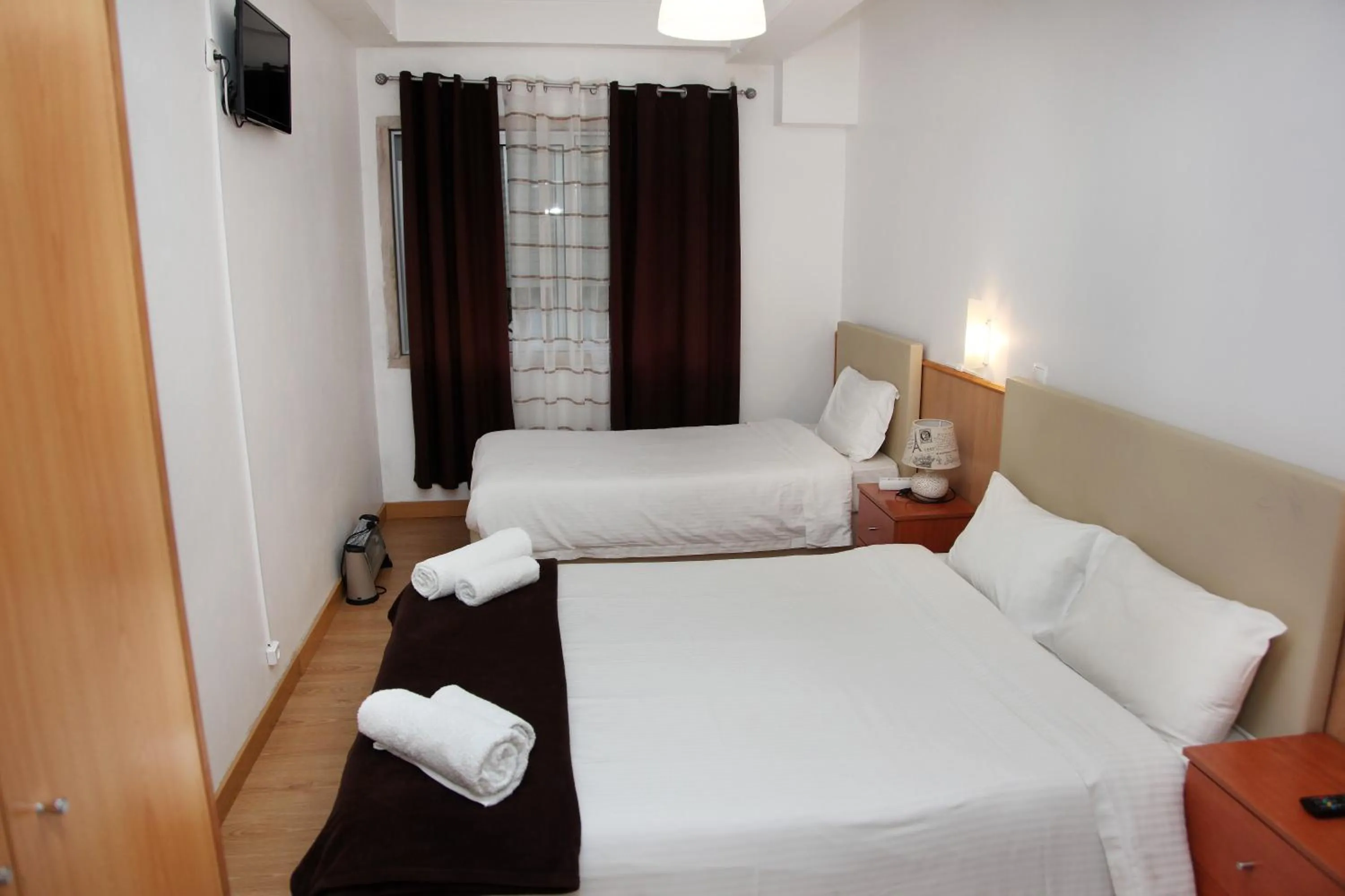 Bed in Lisbon Suite Home