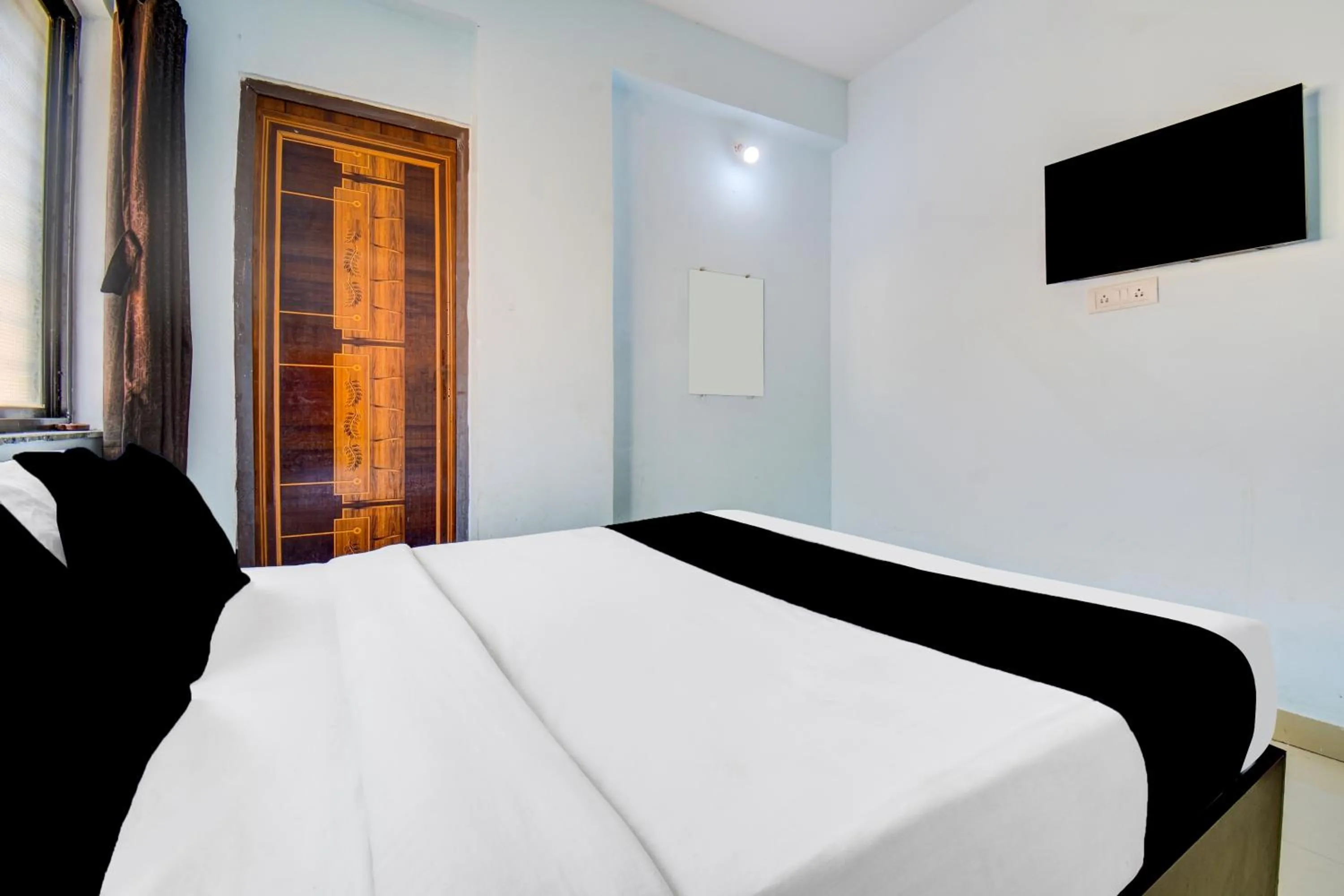 Bedroom, Bed in Super Hotel O Western Avenue Pune Formerly Happy Stay