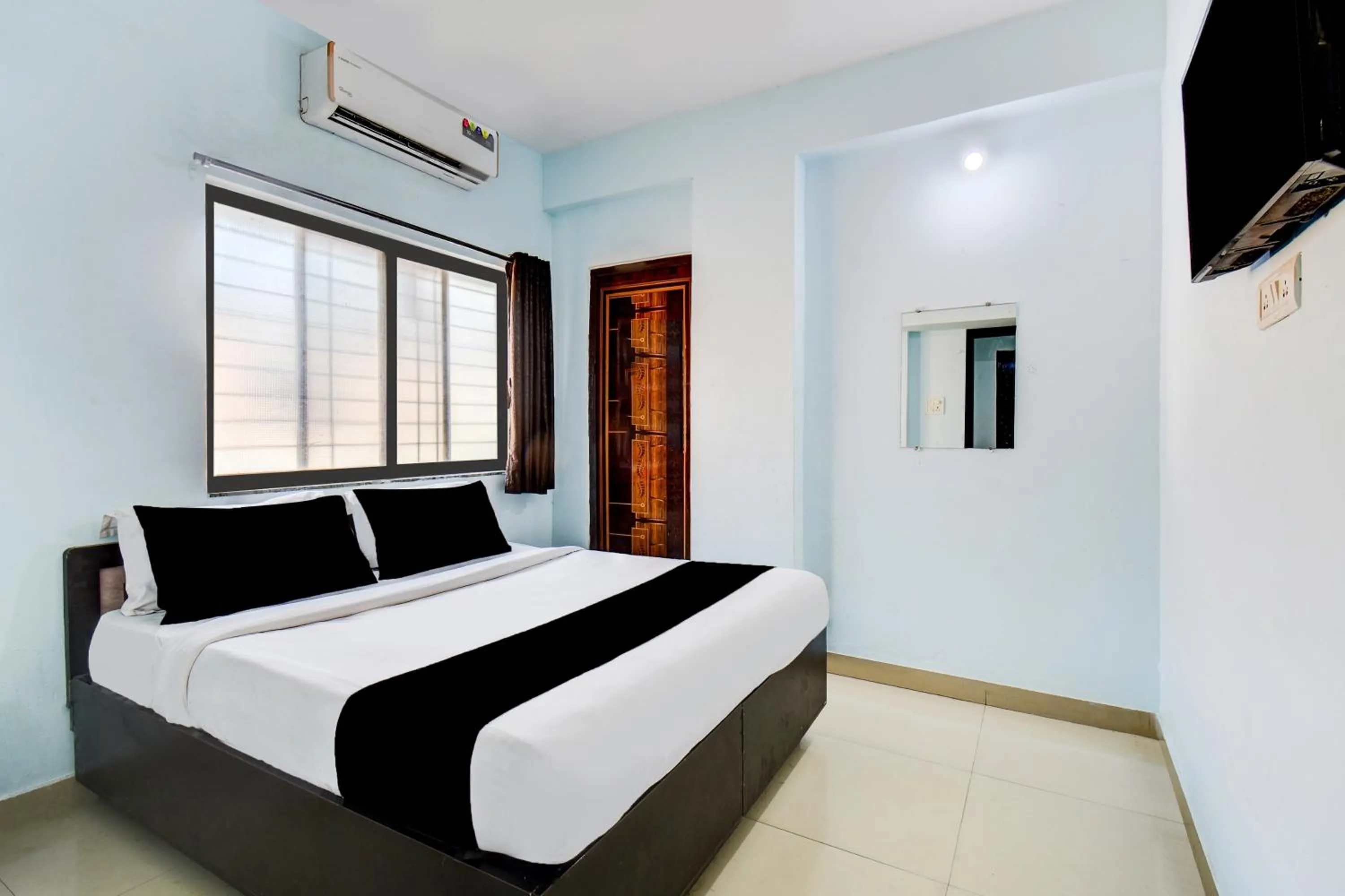 Bedroom, Bed in Hotel O Western Avenue Pune Formerly Happy Stay