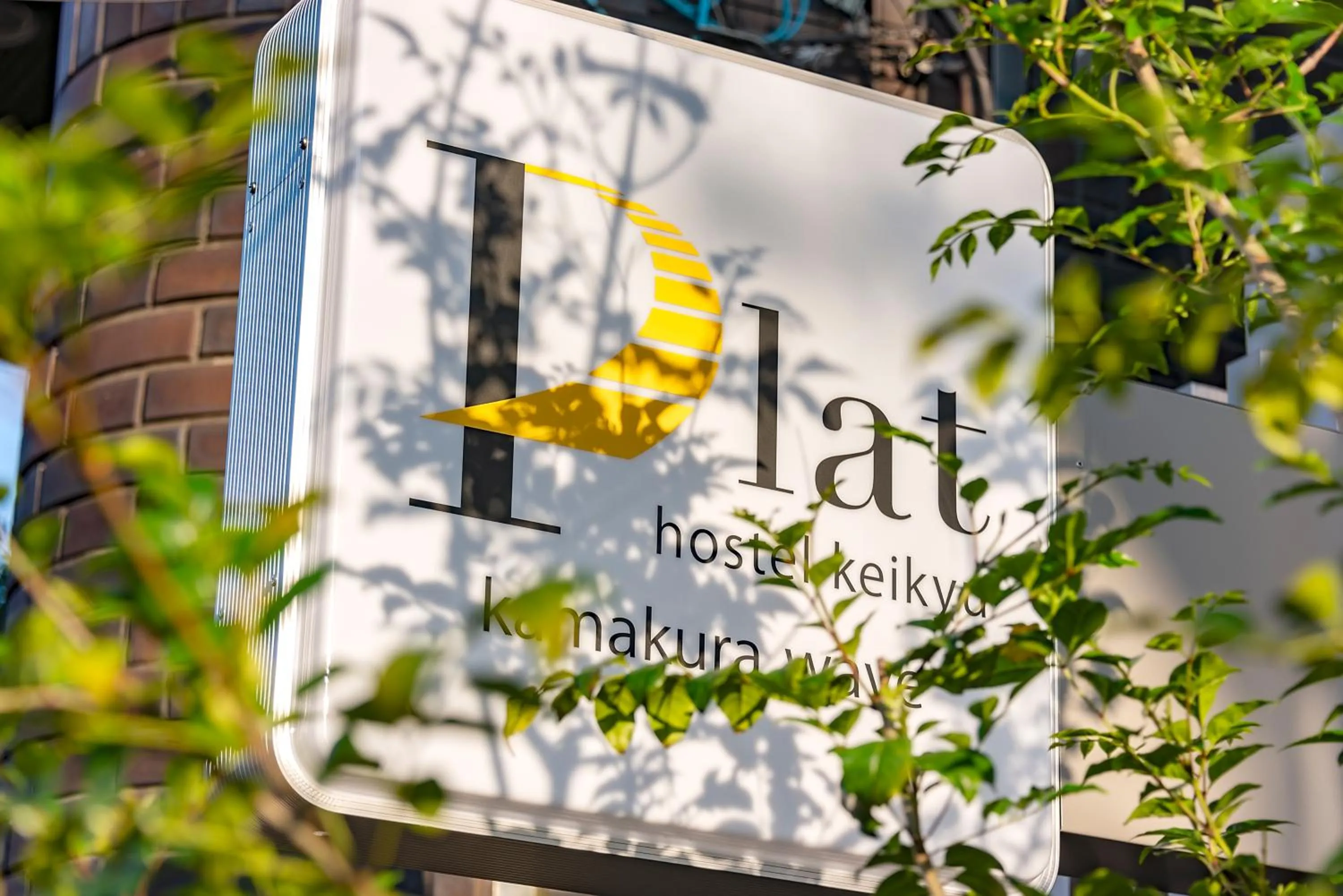 Property logo or sign in plat hostel keikyu kamakura wave