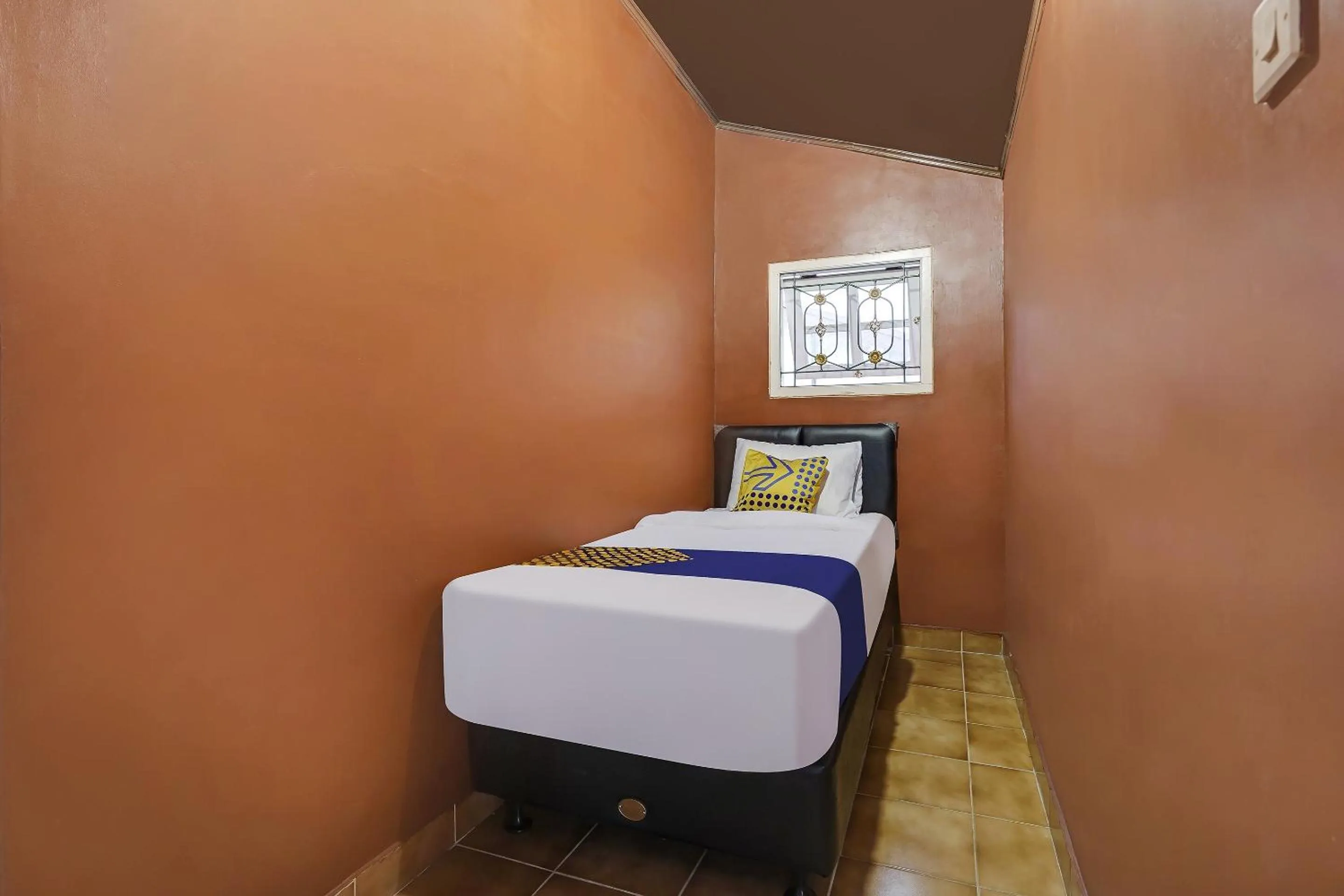 Bedroom in SPOT ON 91107 Villa Galaxy Resort