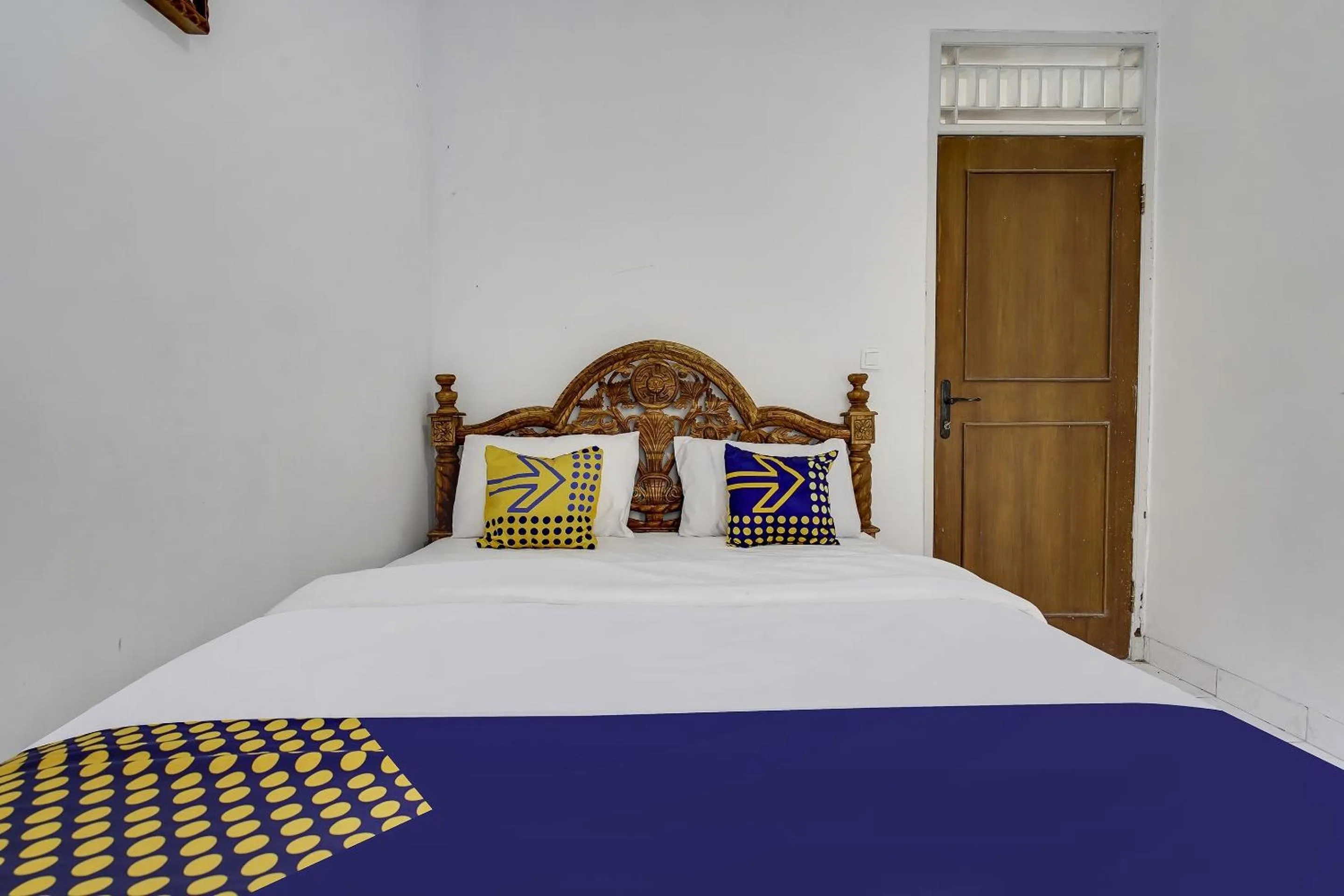 Bedroom in SPOT ON 91107 Villa Galaxy Resort