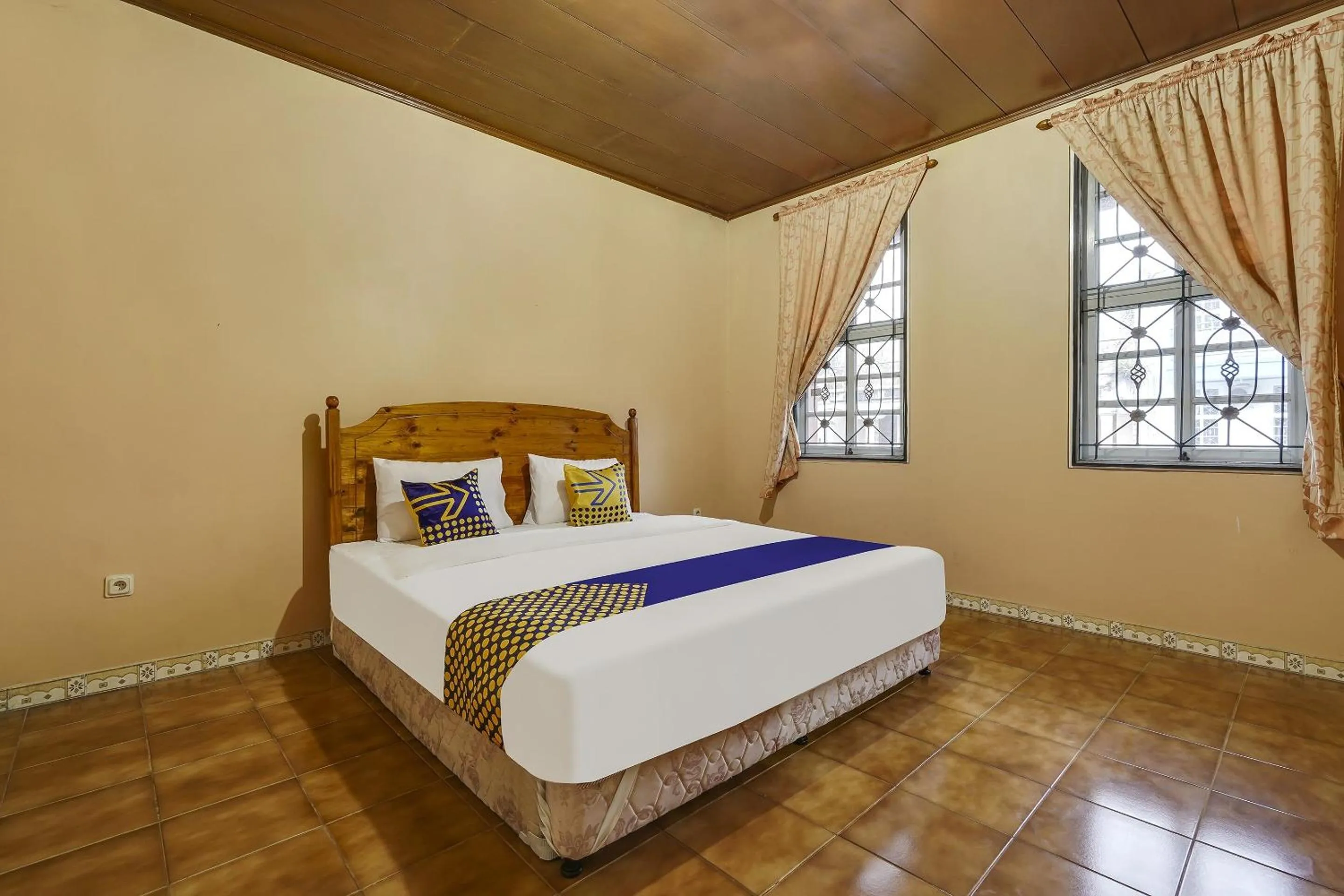 Bedroom in SPOT ON 91107 Villa Galaxy Resort