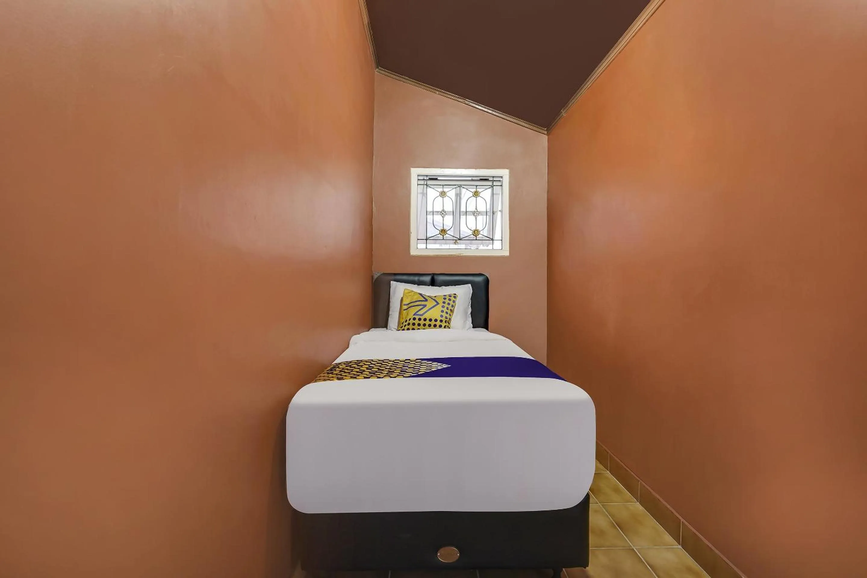 Bedroom in SPOT ON 91107 Villa Galaxy Resort