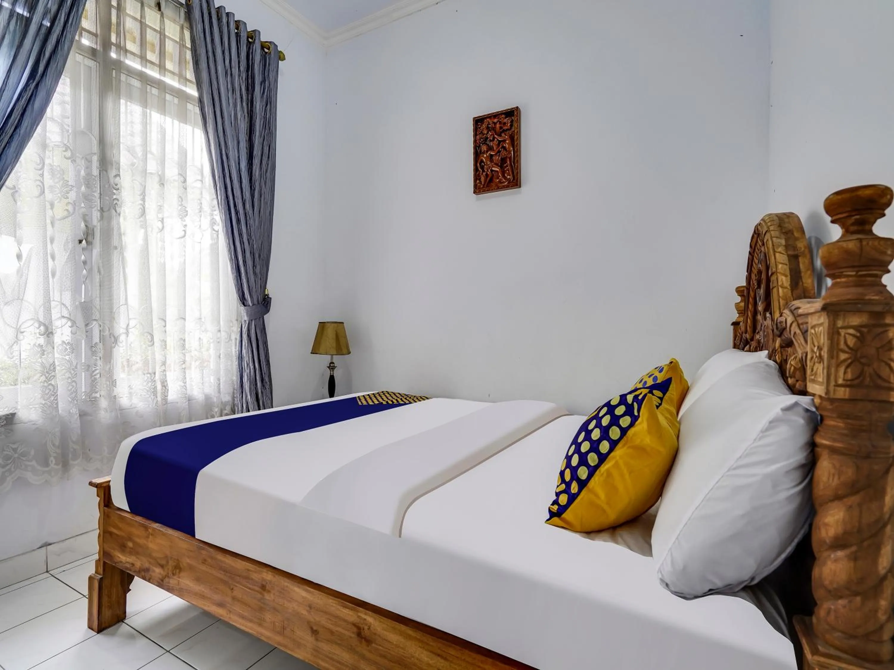 Bedroom in SPOT ON 91107 Villa Galaxy Resort