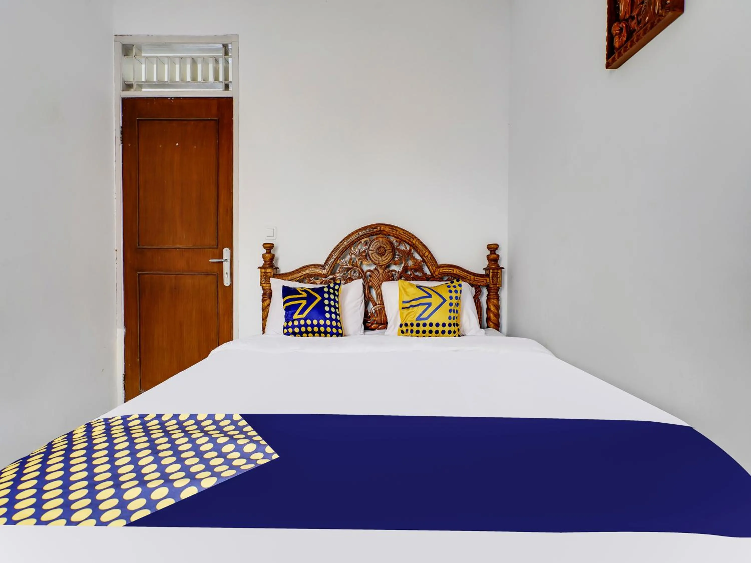 Bedroom in SPOT ON 91107 Villa Galaxy Resort