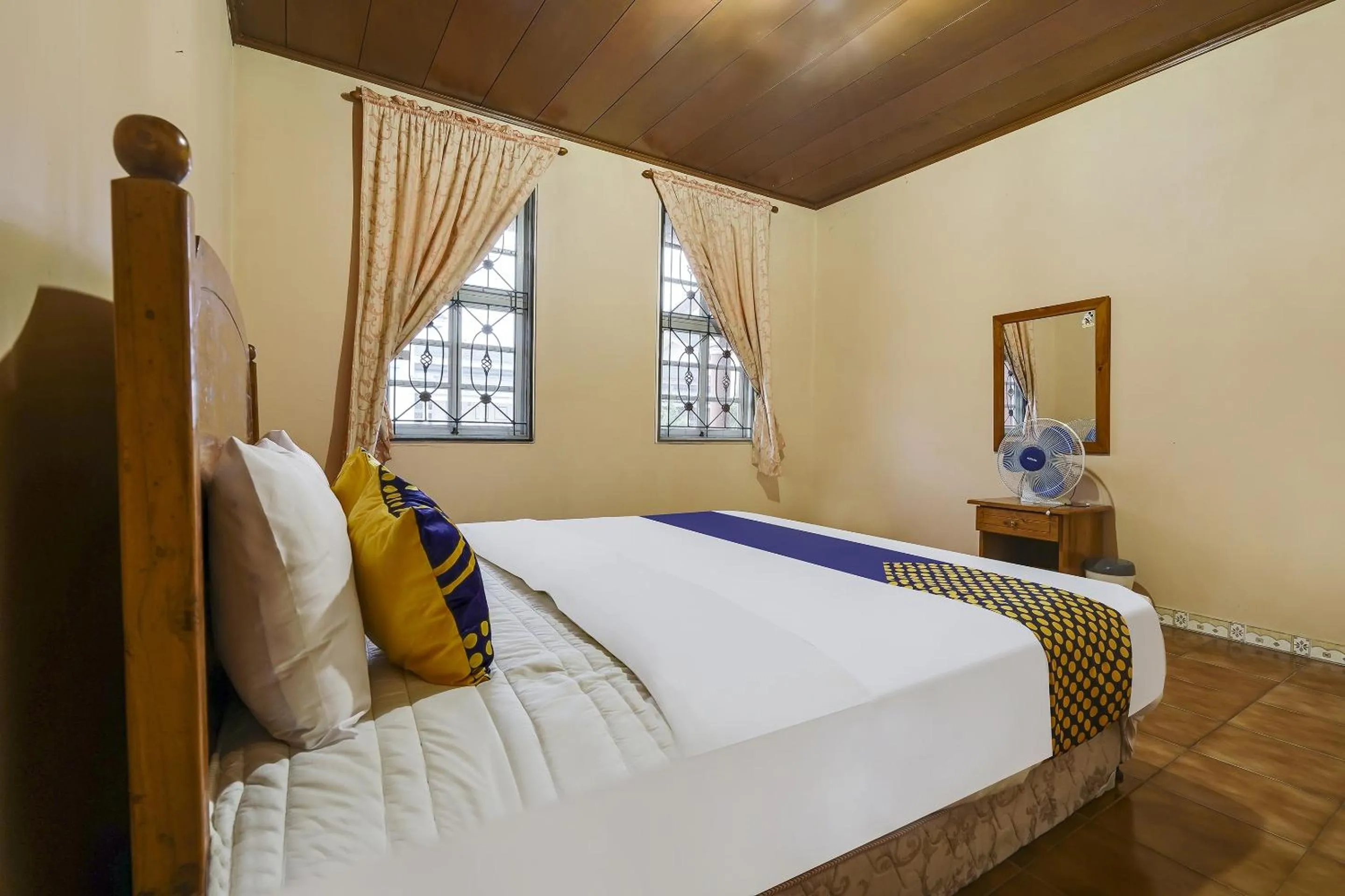 Bedroom in SPOT ON 91107 Villa Galaxy Resort