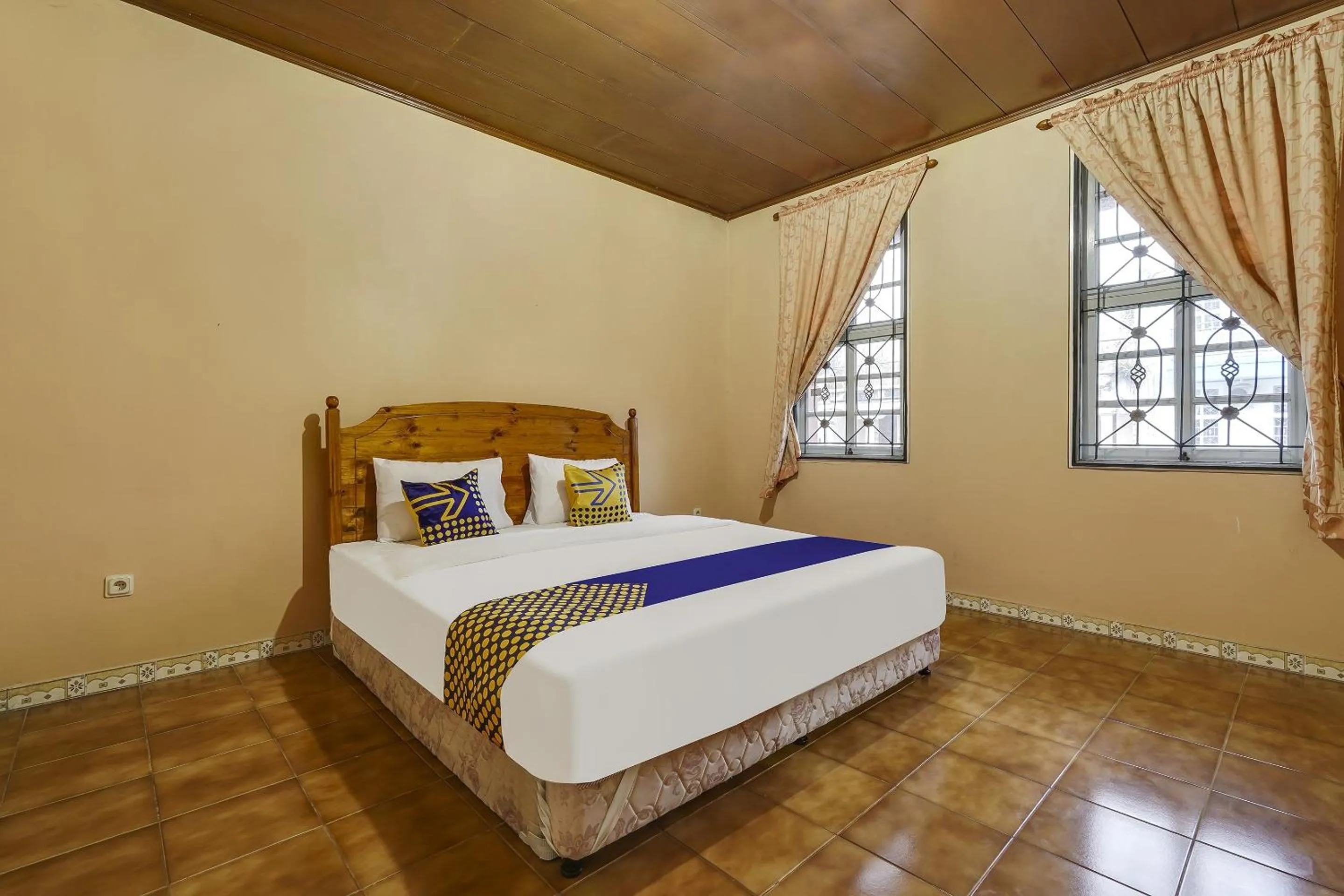 Bedroom in SPOT ON 91107 Villa Galaxy Resort