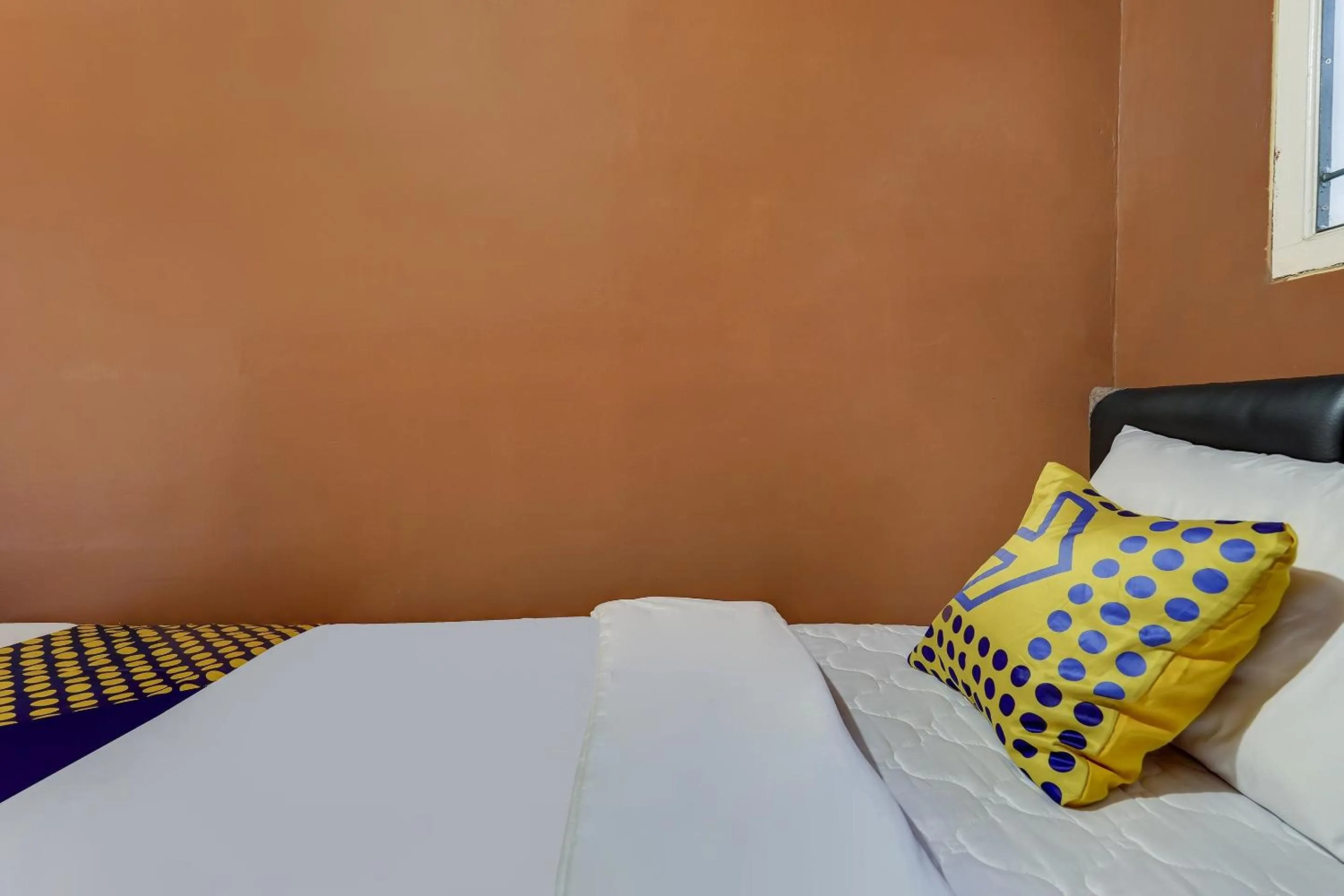 Bedroom in SPOT ON 91107 Villa Galaxy Resort