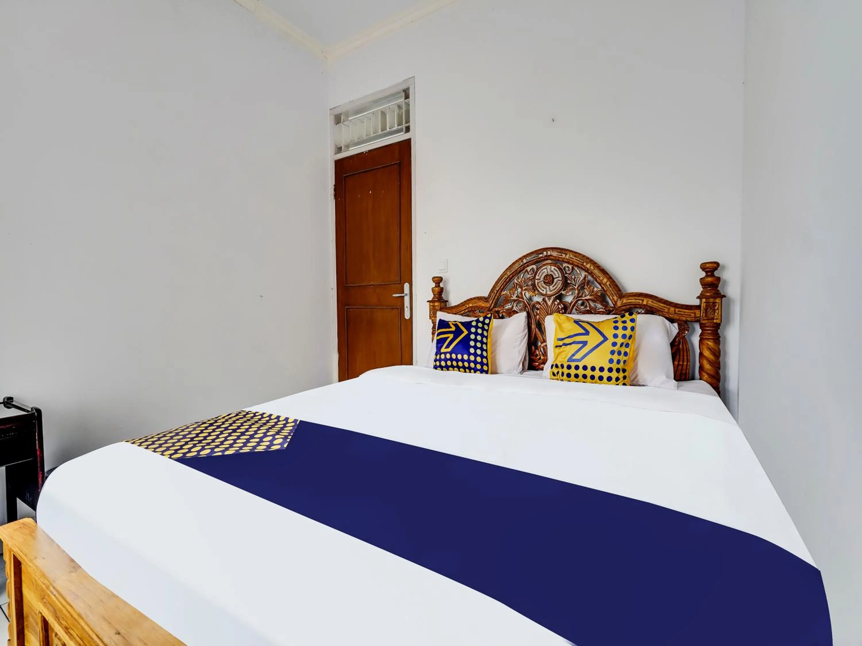 Bedroom in SPOT ON 91107 Villa Galaxy Resort