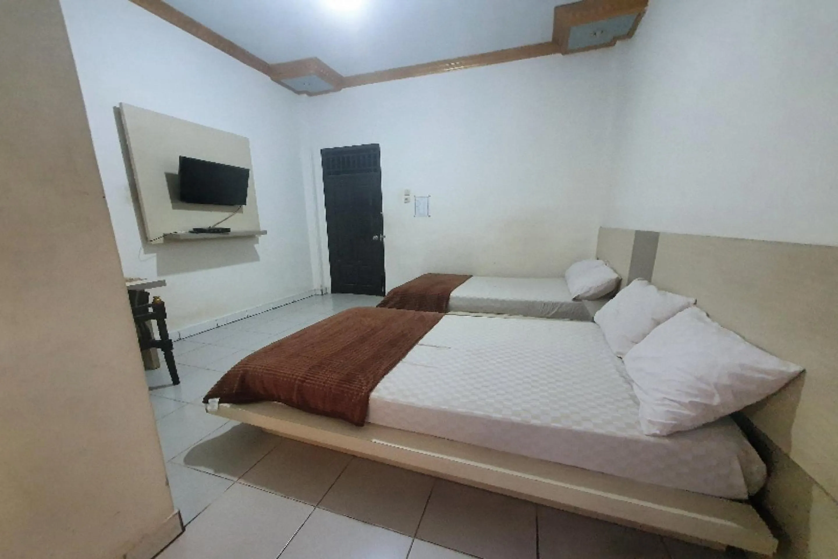 Bedroom in Hotel O Atika