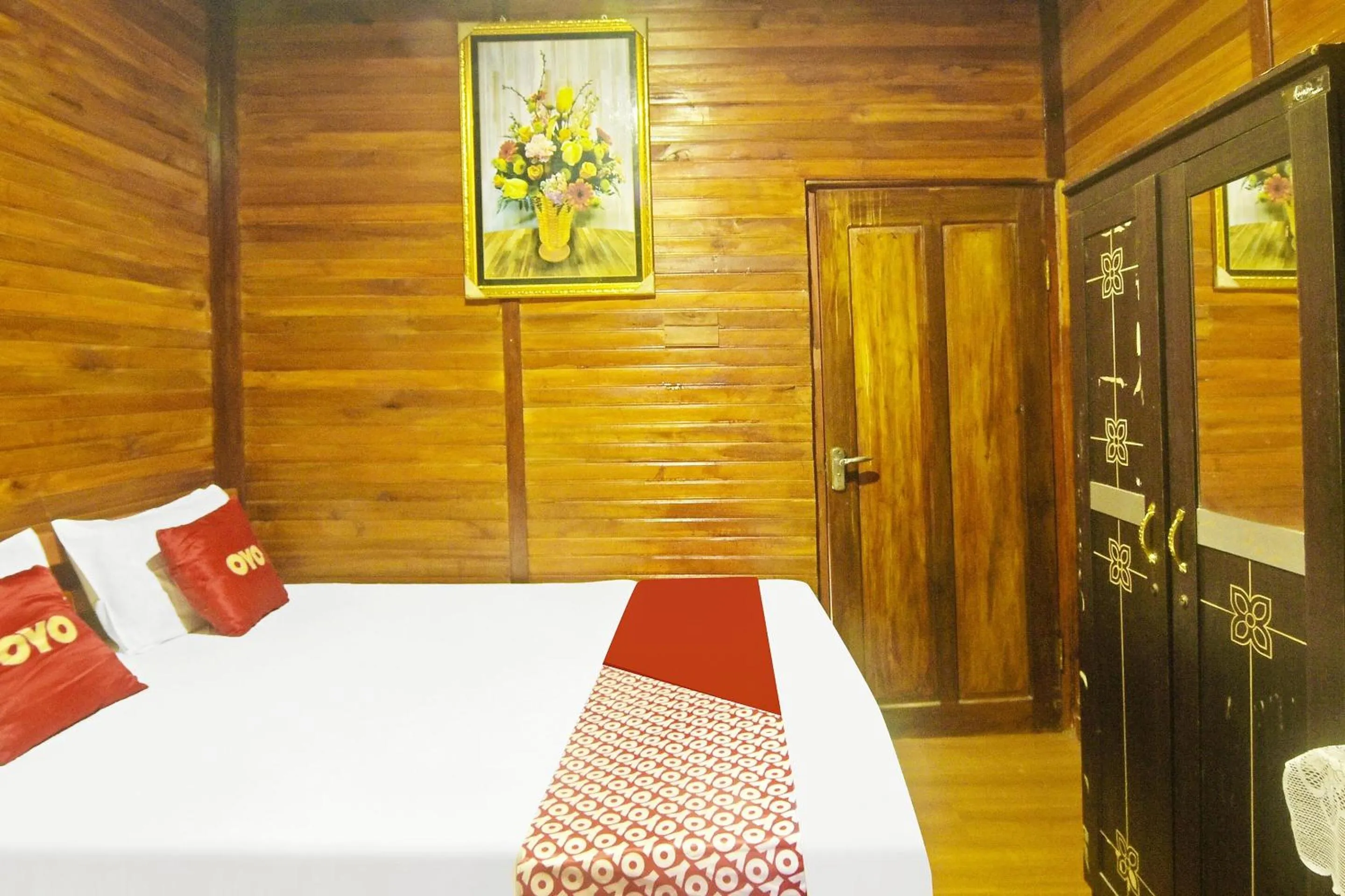 Bedroom in Hotel O Desa Wisata Marinsow Near Gereja Pantekosta Marinsow