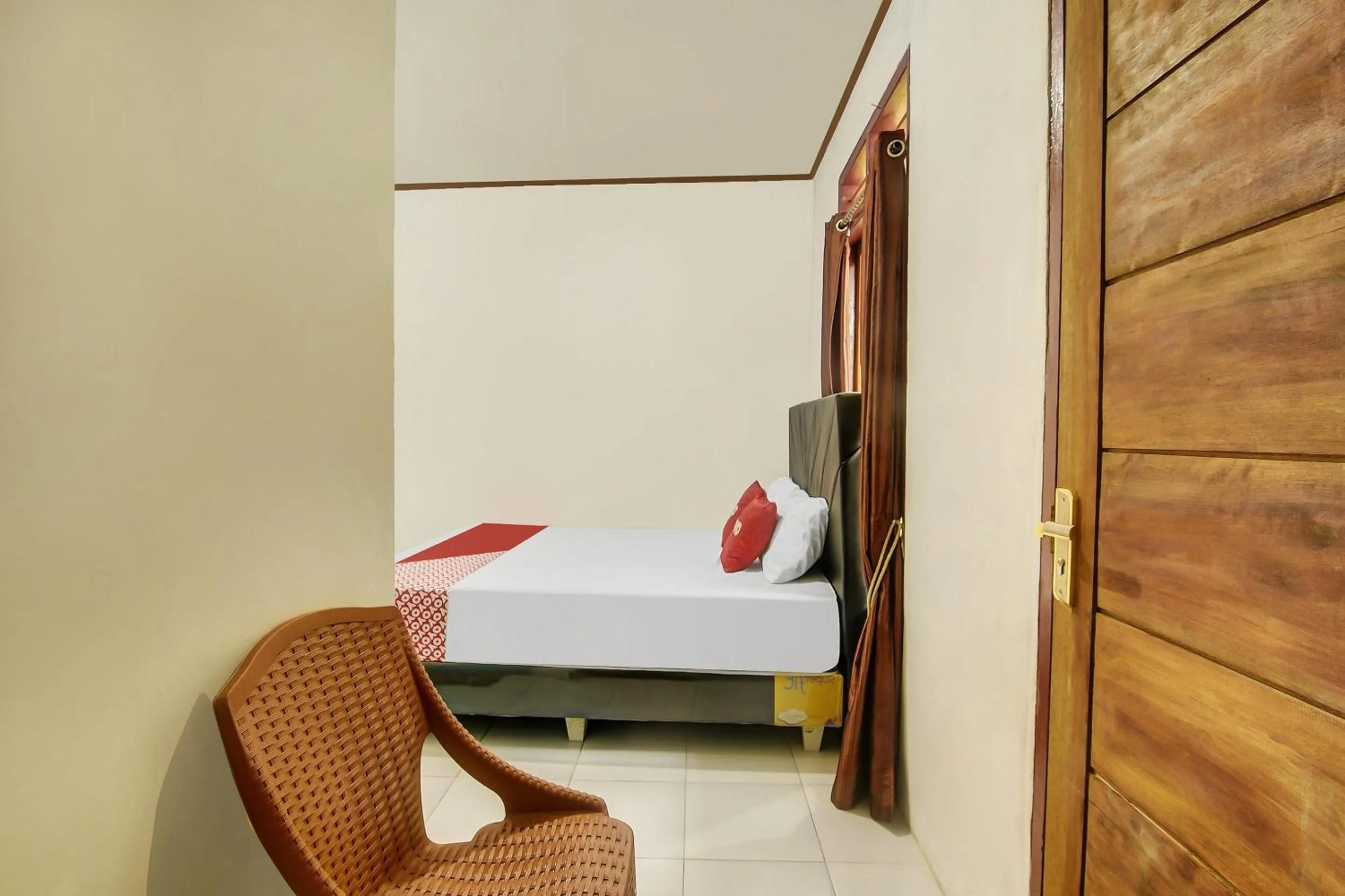 Bedroom in Hotel O Desa Wisata Marinsow Near Gereja Pantekosta Marinsow