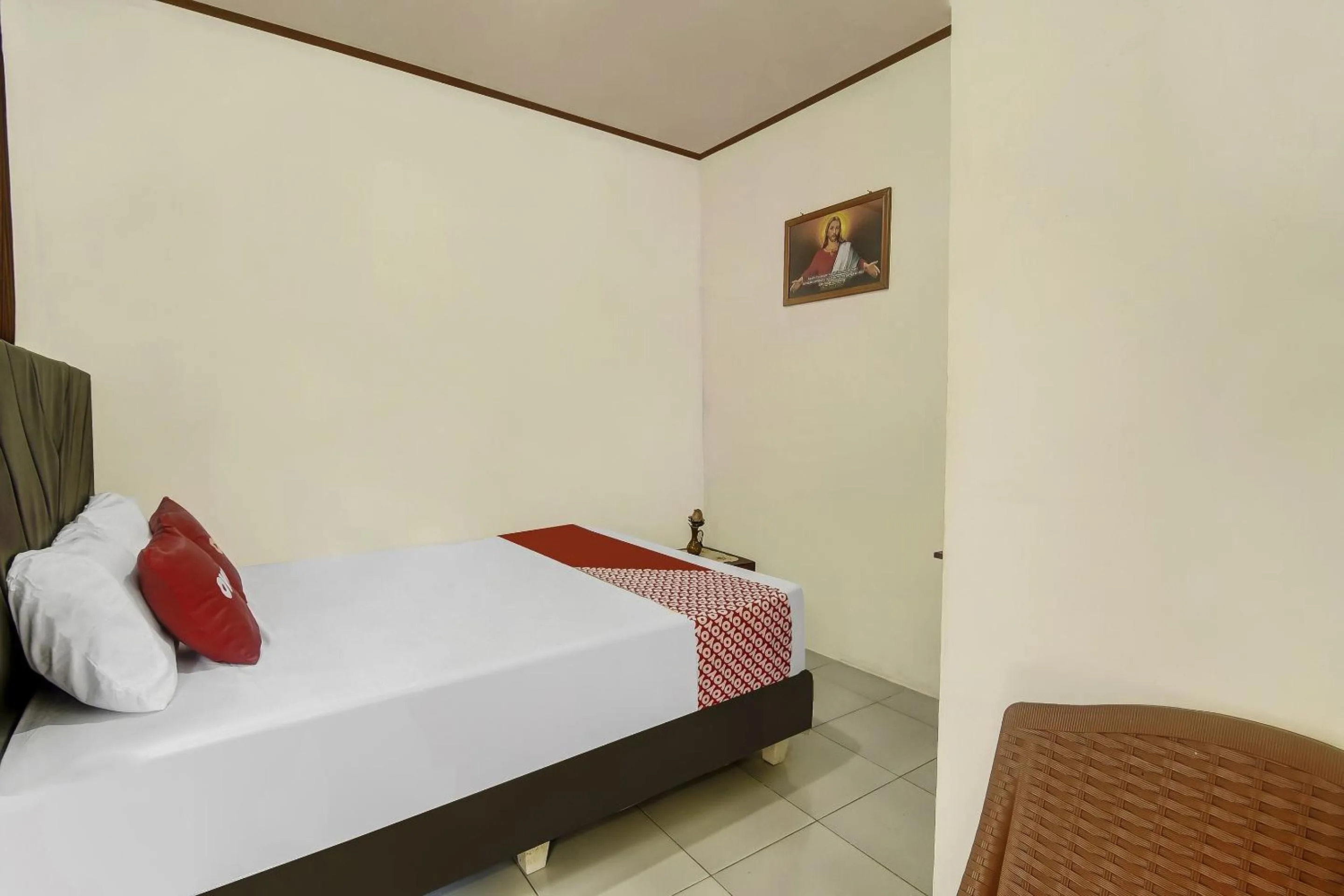 Bedroom in Hotel O Desa Wisata Marinsow Near Gereja Pantekosta Marinsow