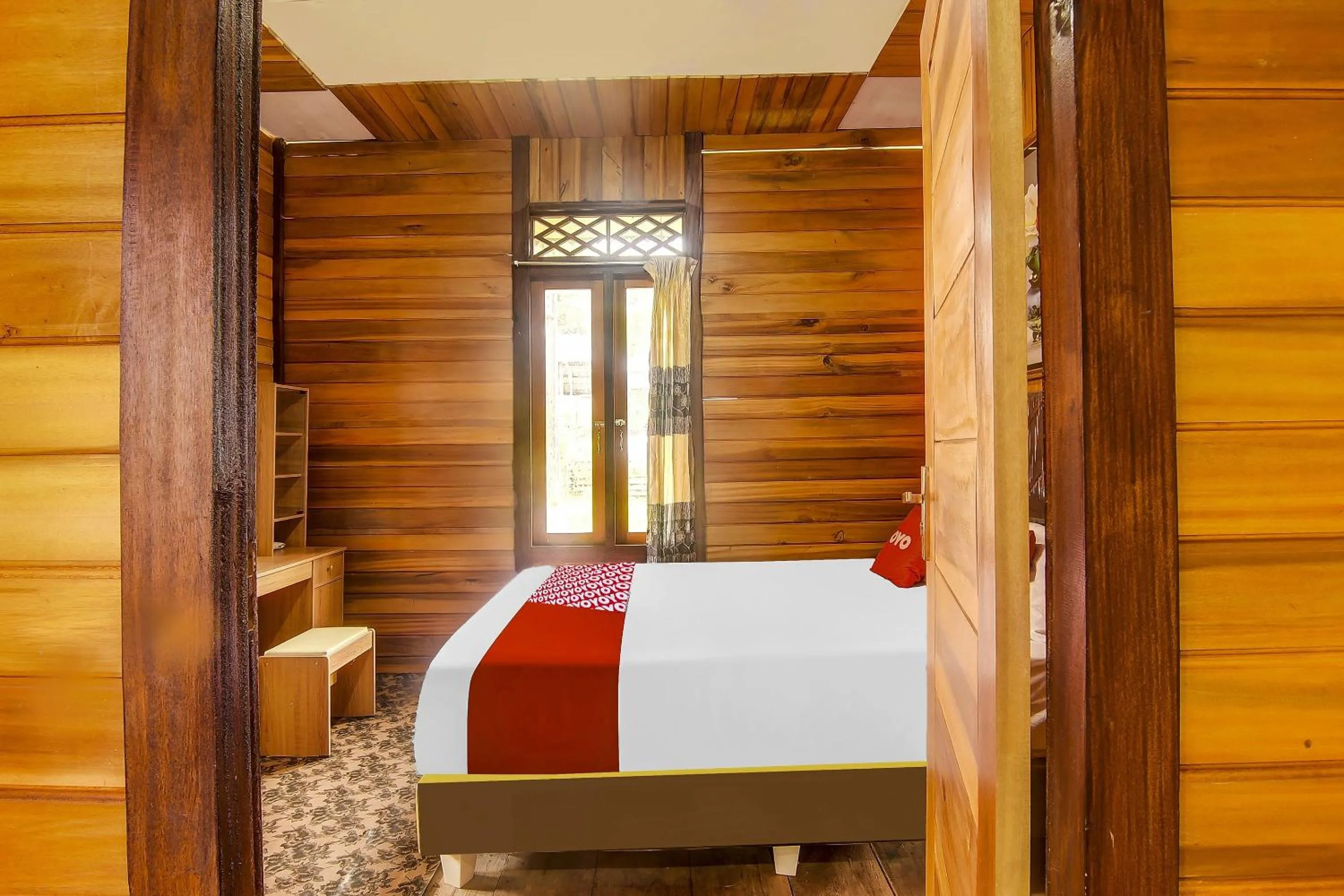 Bedroom in Hotel O Desa Wisata Marinsow Near Gereja Pantekosta Marinsow