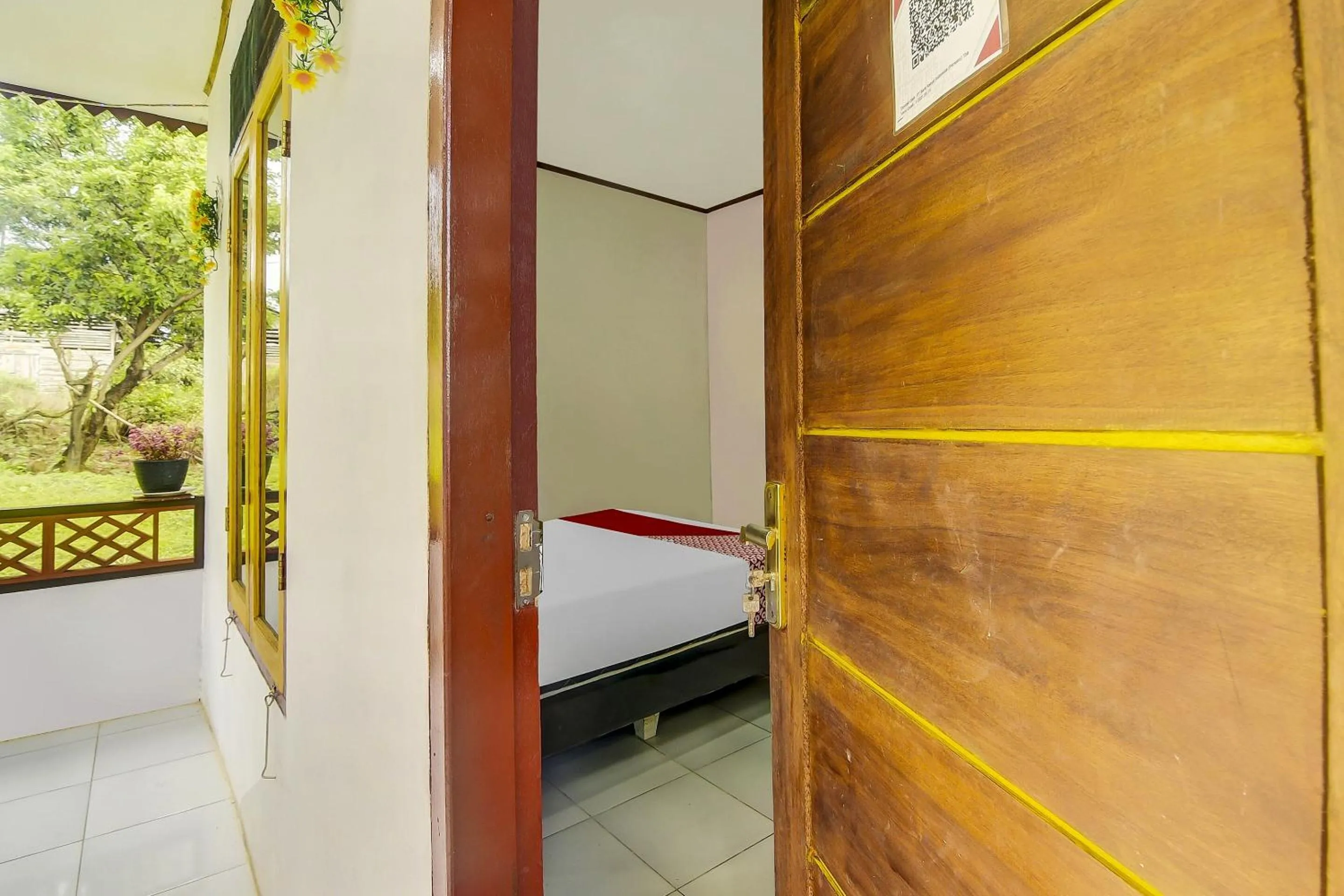 Bedroom in Hotel O Desa Wisata Marinsow Near Gereja Pantekosta Marinsow