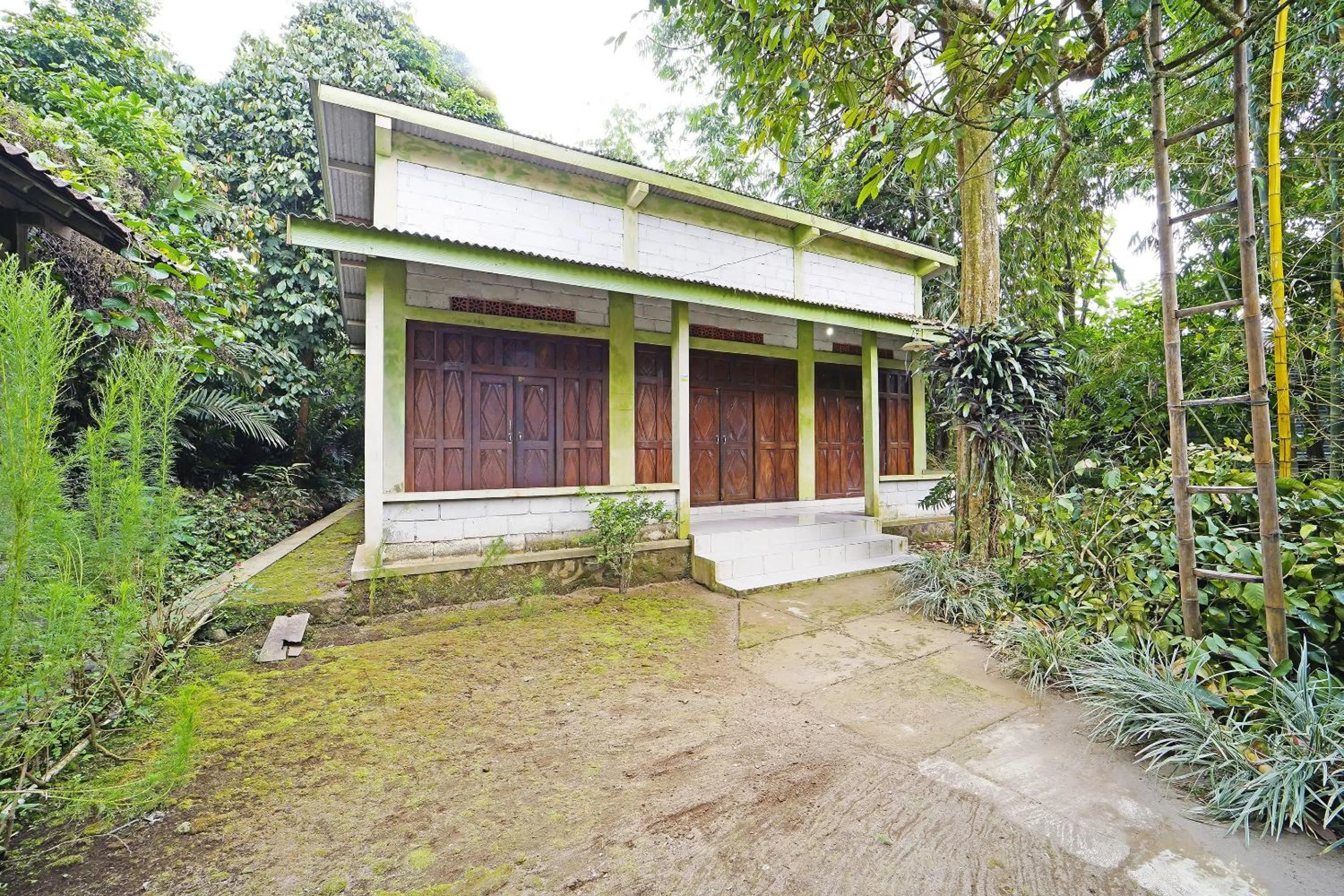 Bedroom in Hotel O Griya Estu Wening