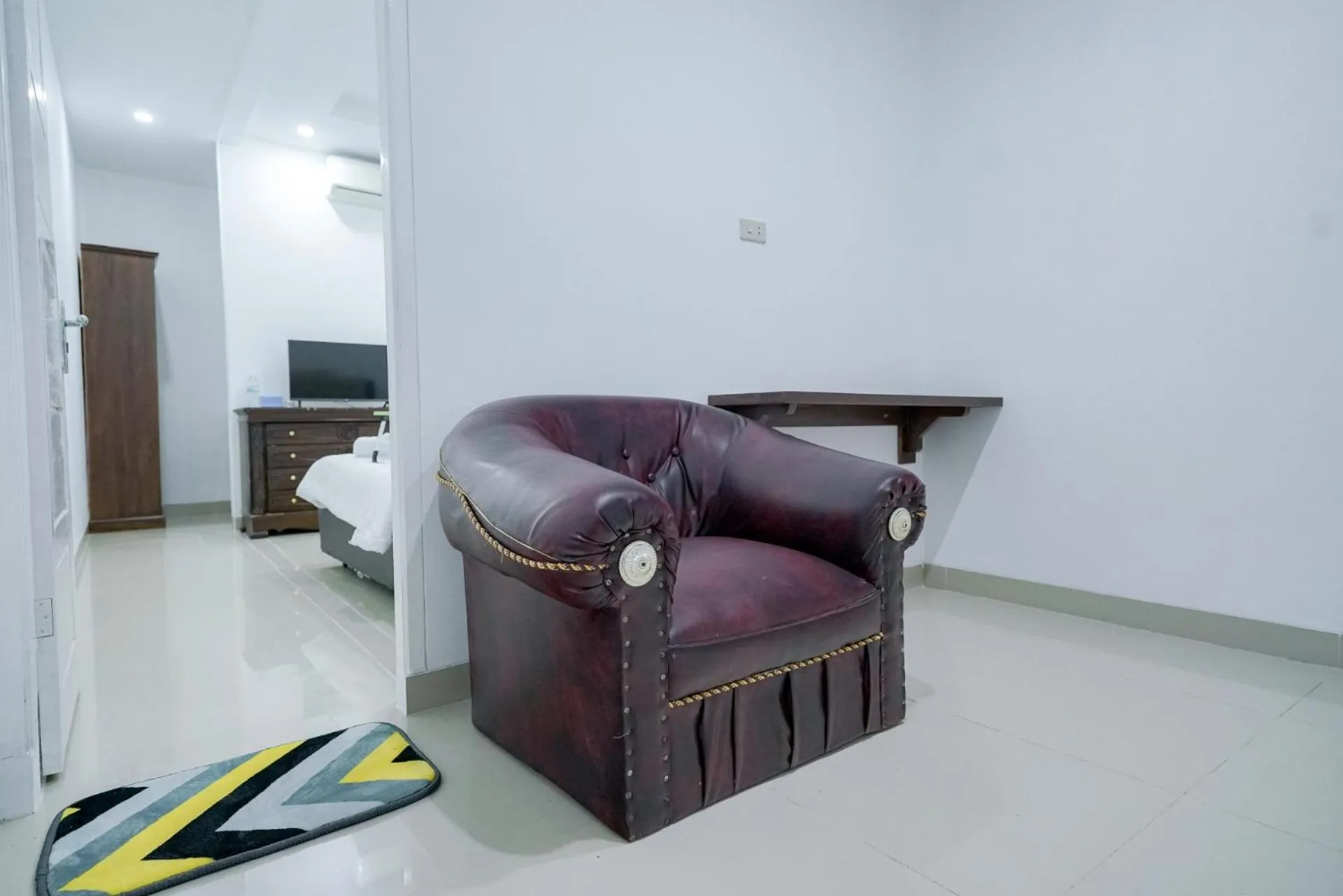 Seating area in Urbanview Hotel Pondok Indah Pringsewu By RedDoorz