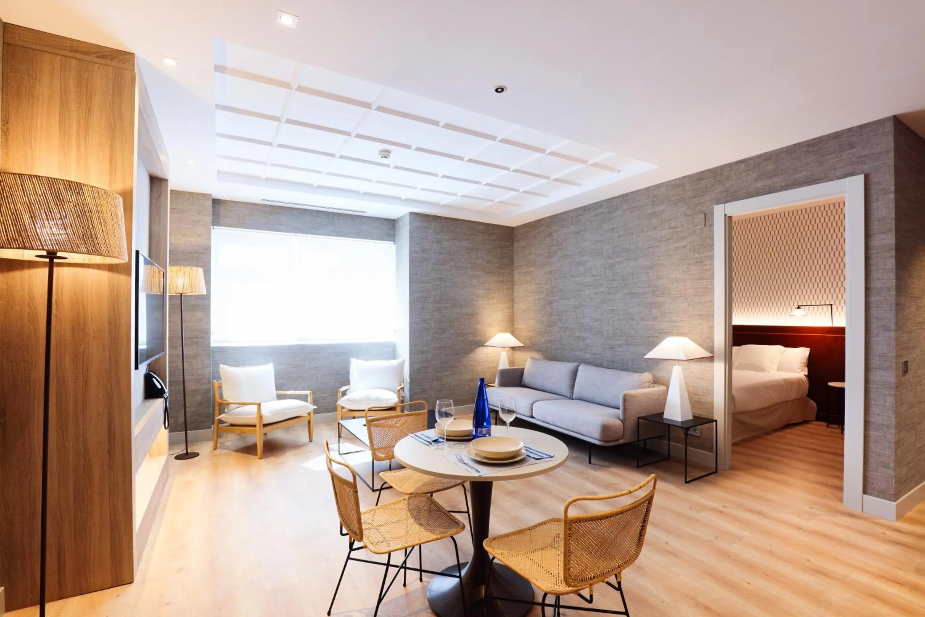 Living room, Bed in THE APARTMENT by assethoteles