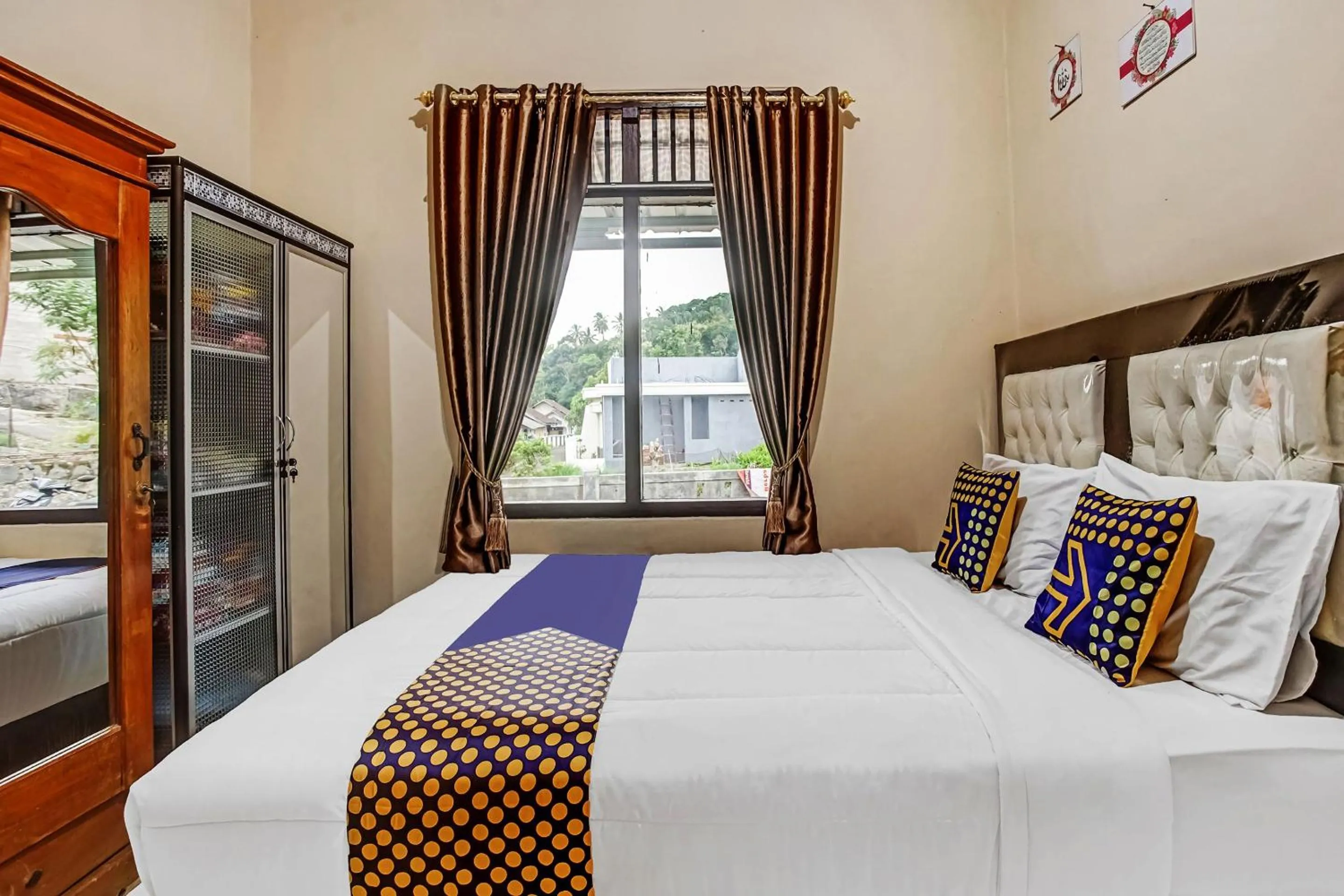 Bedroom in Hotel O Desa Wisata Sumber Agung Syariah