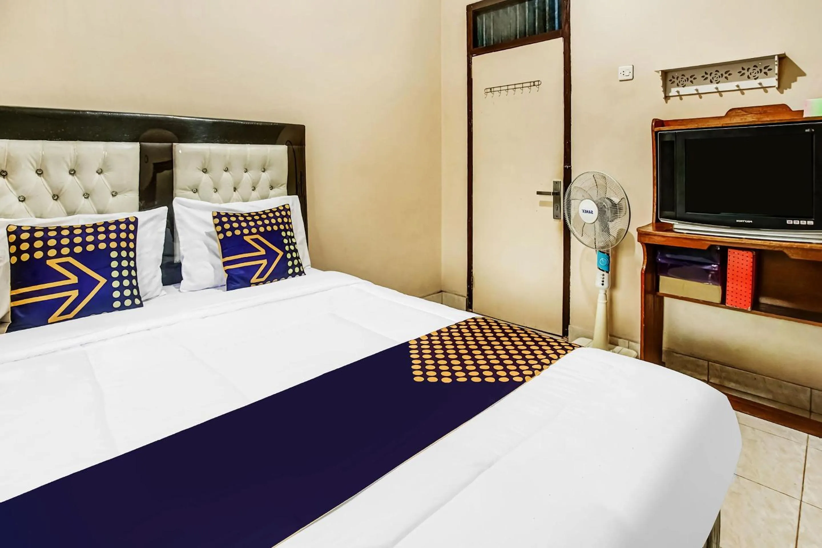 Bedroom in Hotel O Desa Wisata Sumber Agung Syariah