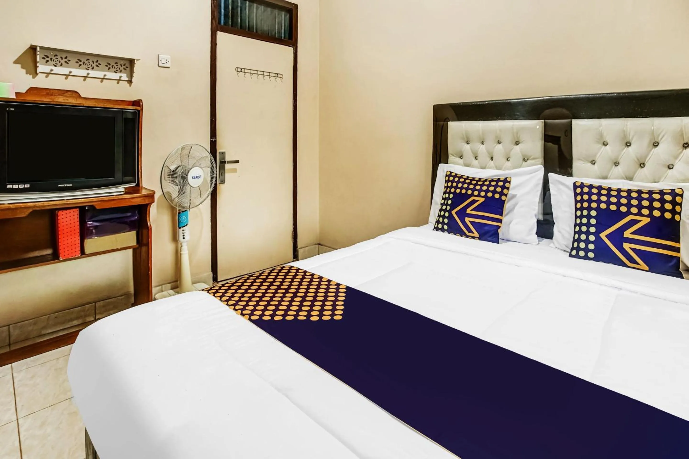 Bedroom in Hotel O Desa Wisata Sumber Agung Syariah