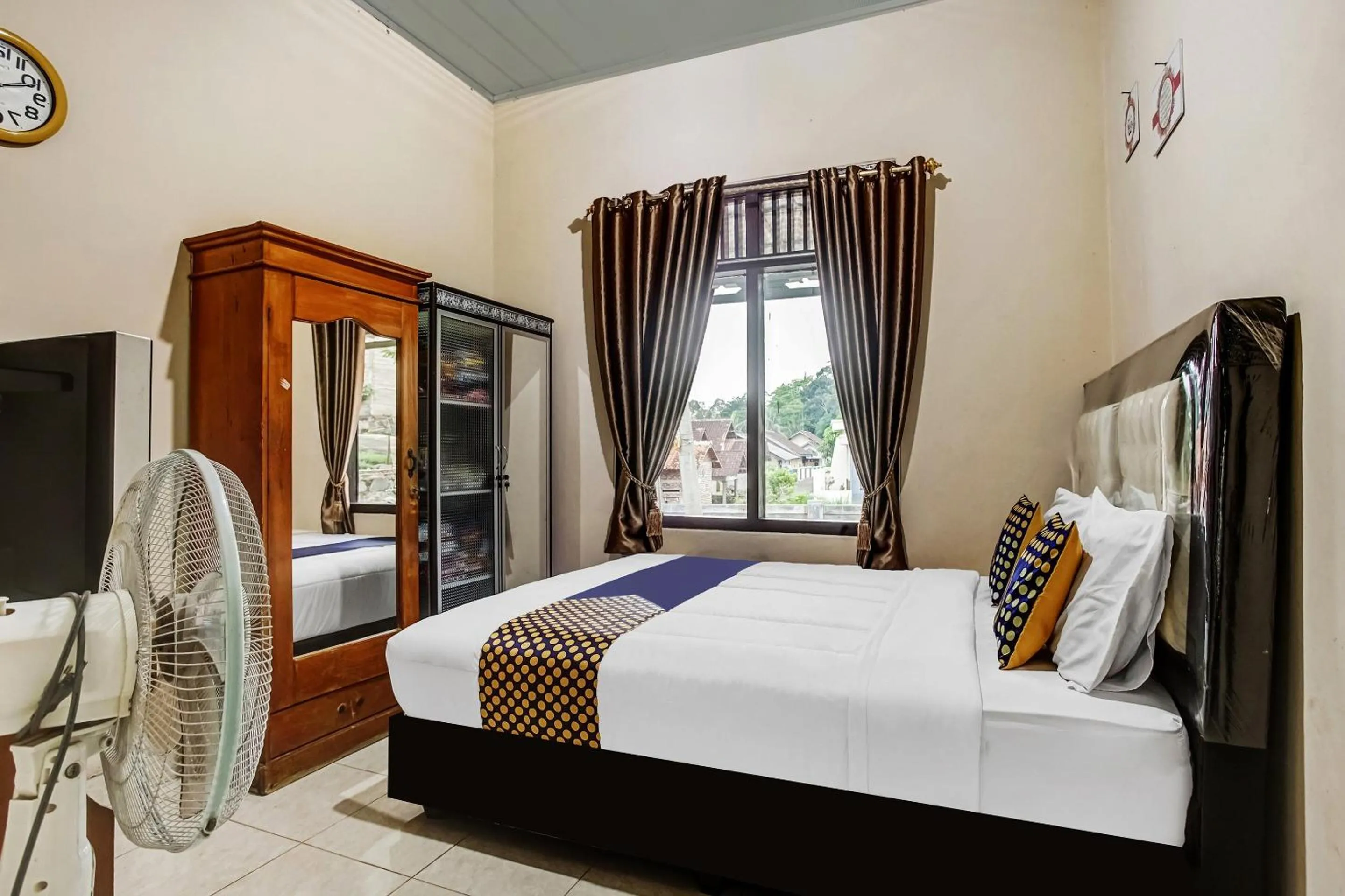 Bedroom in Hotel O Desa Wisata Sumber Agung Syariah
