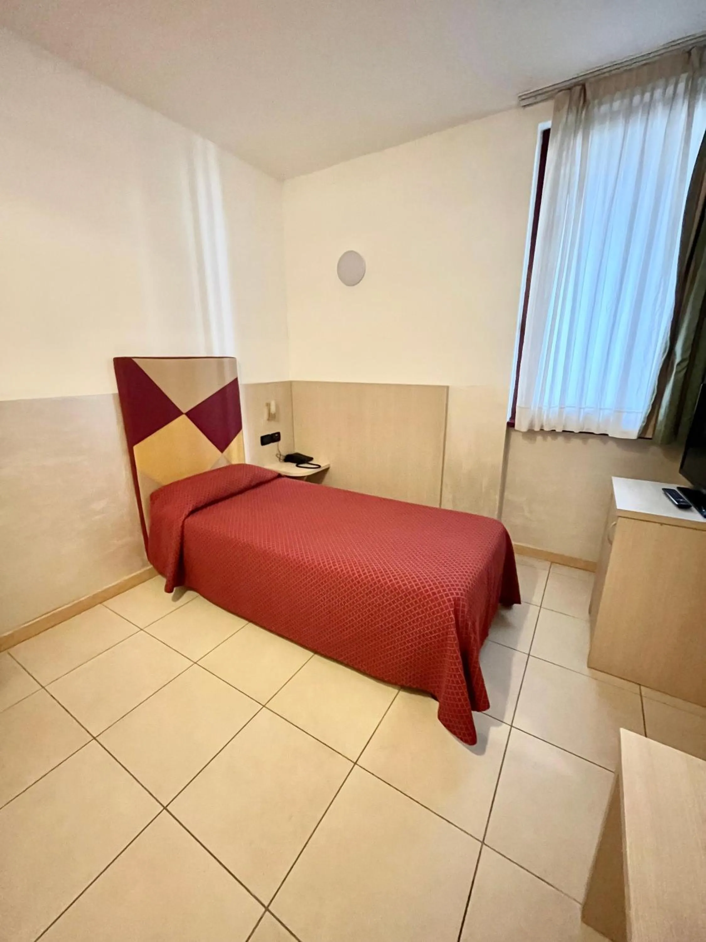 Bed in Hotel Lovere Resort & Spa