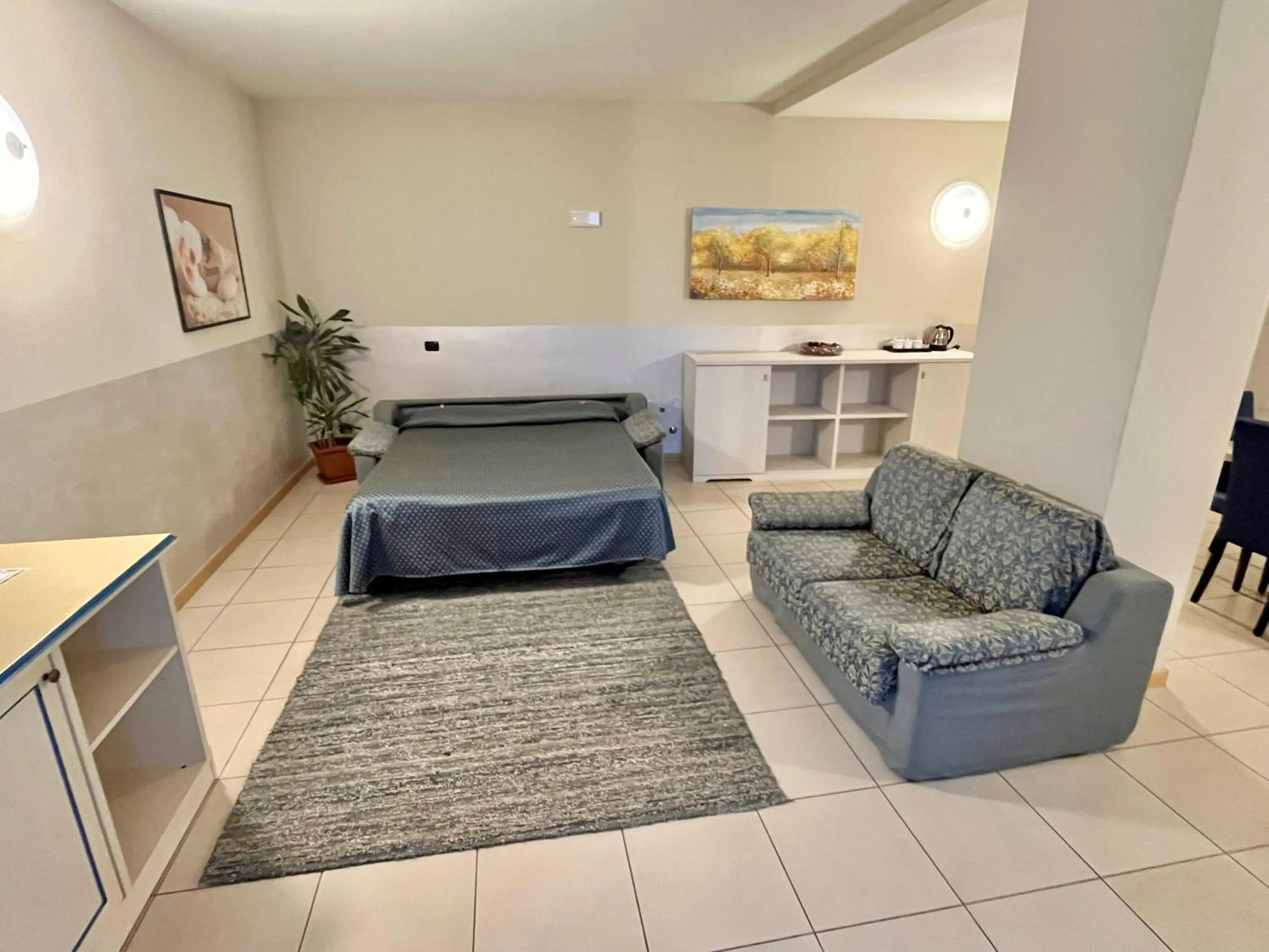 Living room, Bed in Hotel Lovere Resort & Spa