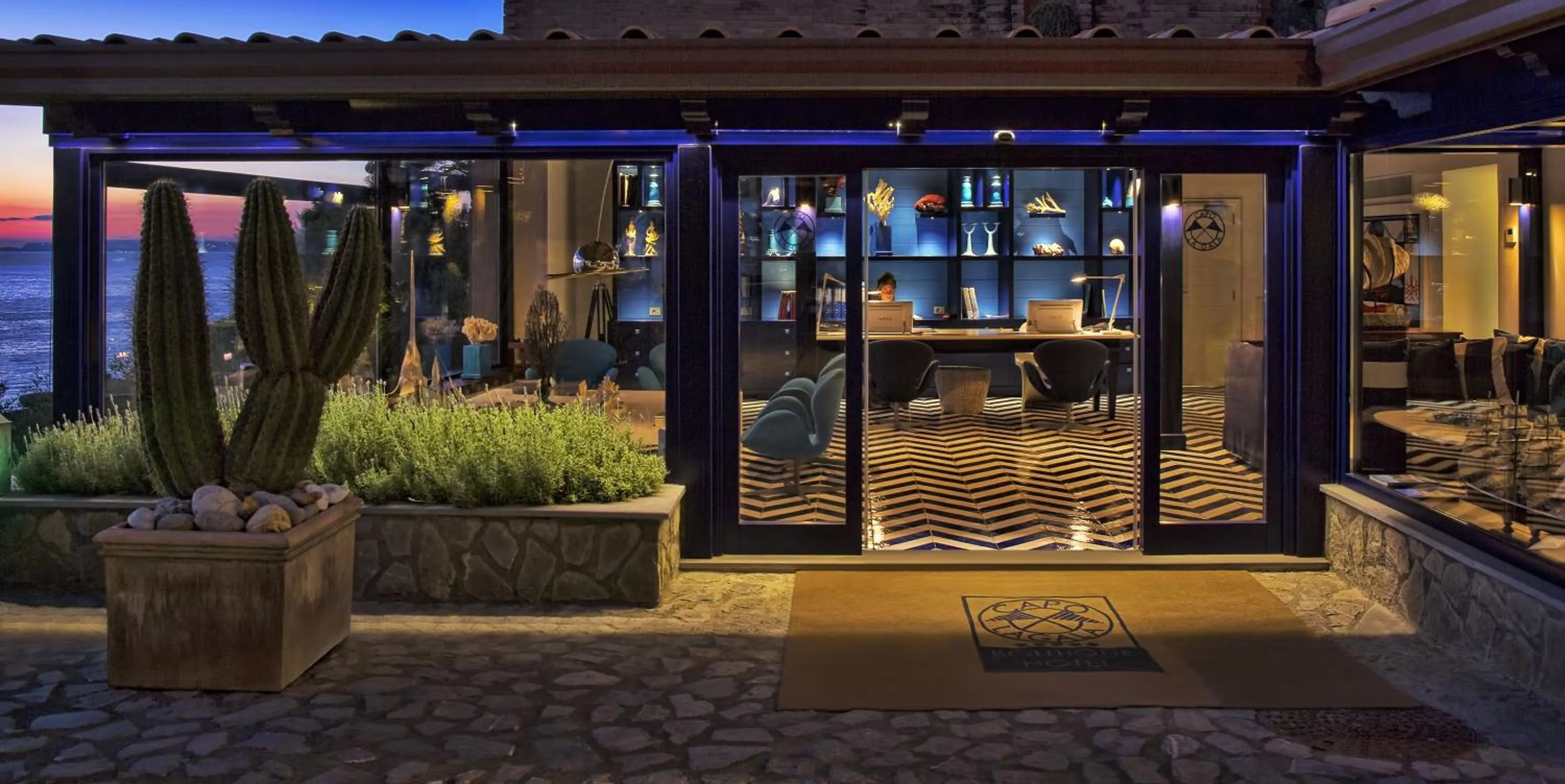 Lobby or reception in Capo la Gala Hotel&Wellness