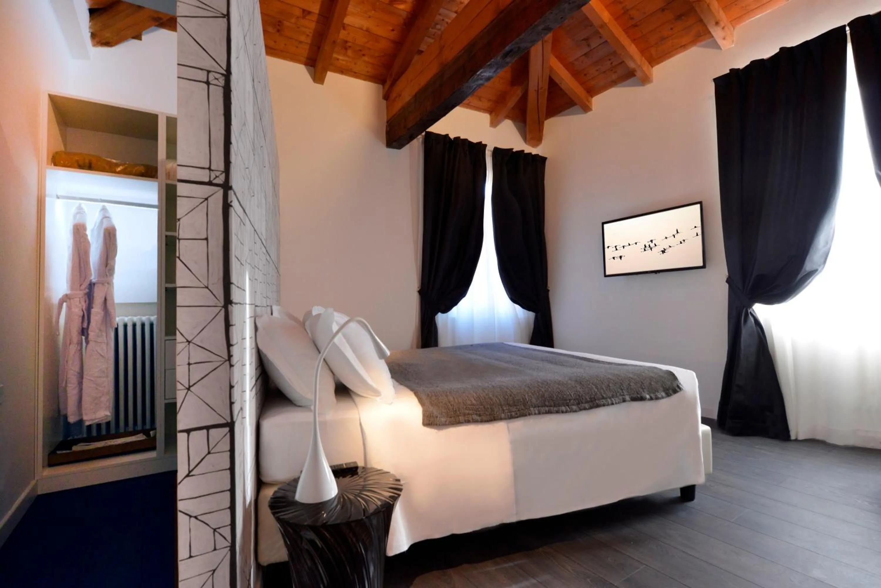 Photo of the whole room, Bed in Phi Hotel Bologna Apartments