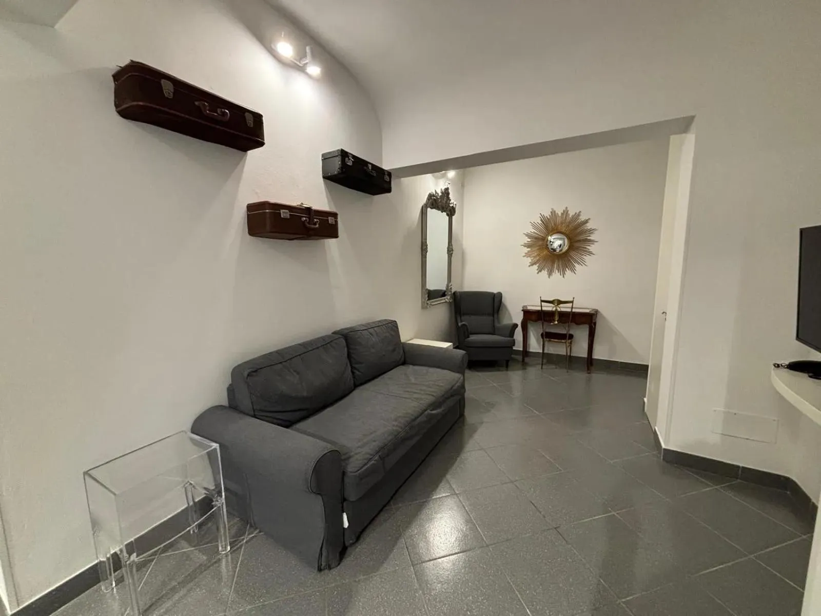 Communal lounge/ TV room in Phi Hotel Bologna Apartments