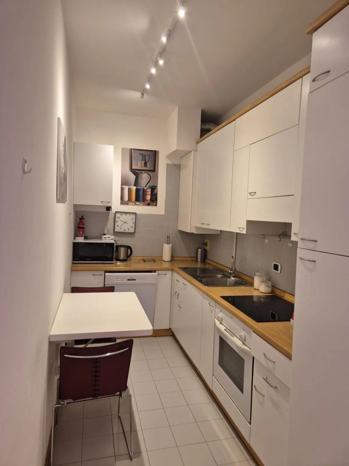 Kitchen or kitchenette in Phi Hotel Bologna Apartments
