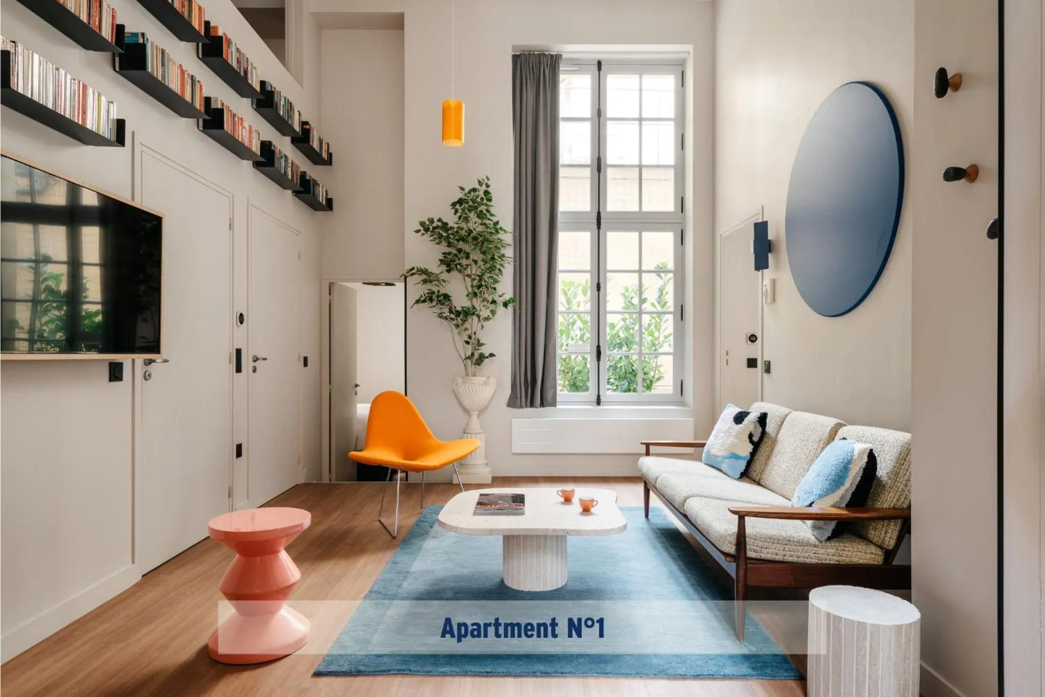 TV and multimedia in Edgar Suites Louvre - Jour