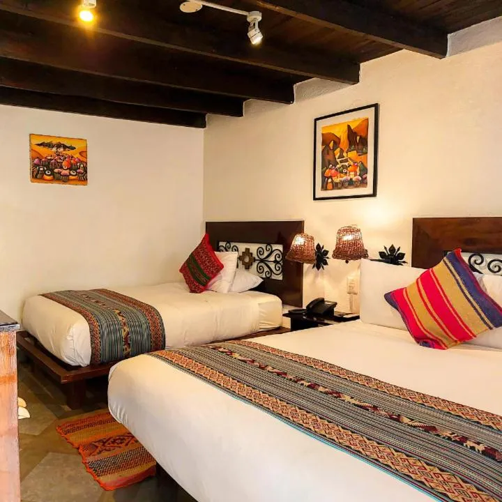 Bed in SACRED STONE Boutique Hotel
