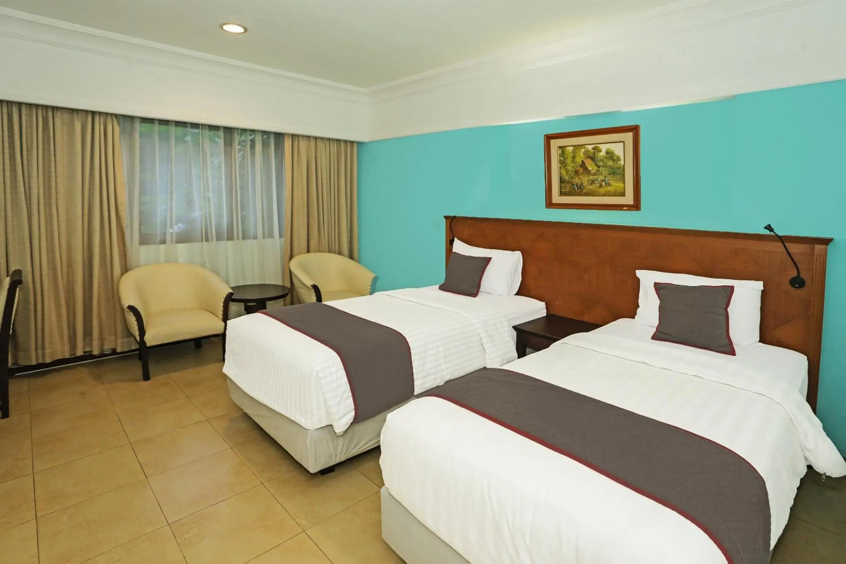 Delxue Twin Room - single occupancy in Collection O 91898 Series Hotel Kuningan Delxue Twin Room - single occupancy in Collection O 91898 Series Hotel Kuningan