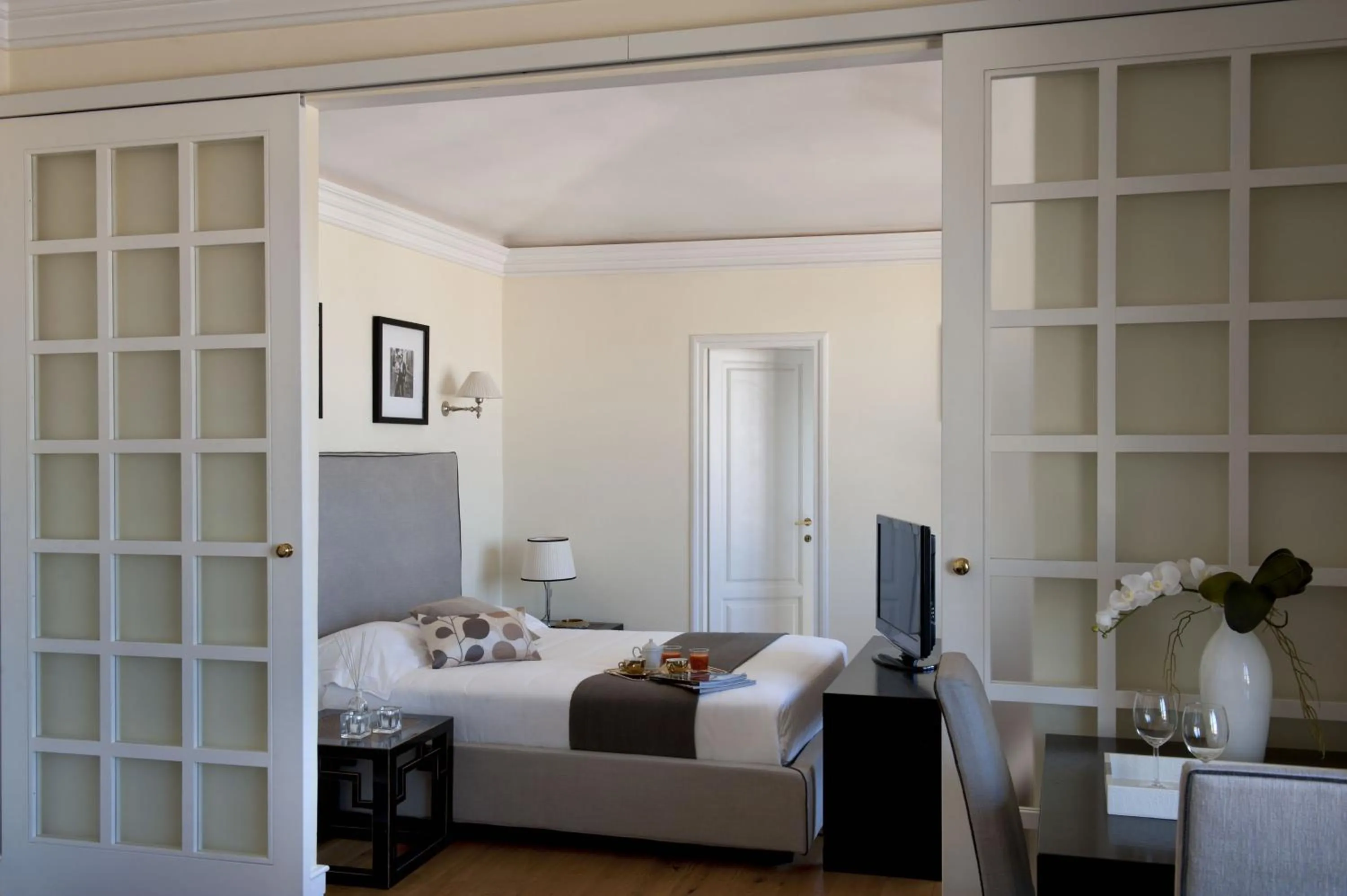 Bed in Tornabuoni Suites Collection Residenza D'Epoca