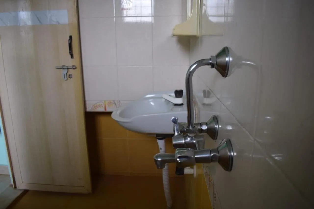 Shower in Nature Inn Cottages