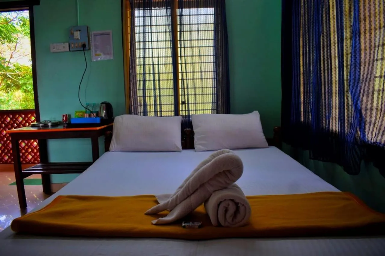 Bed in Nature Inn Cottages