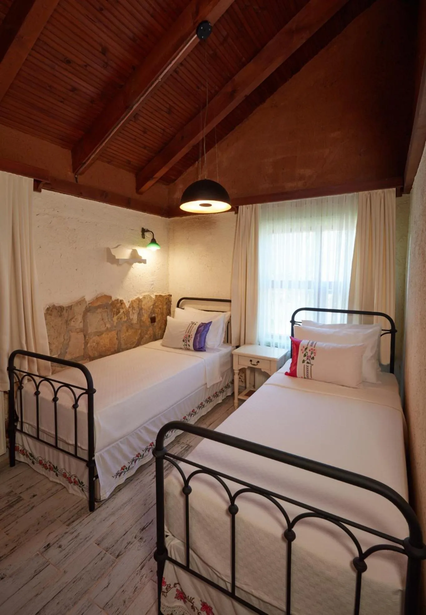 Bed in Dachas Cove Hotel